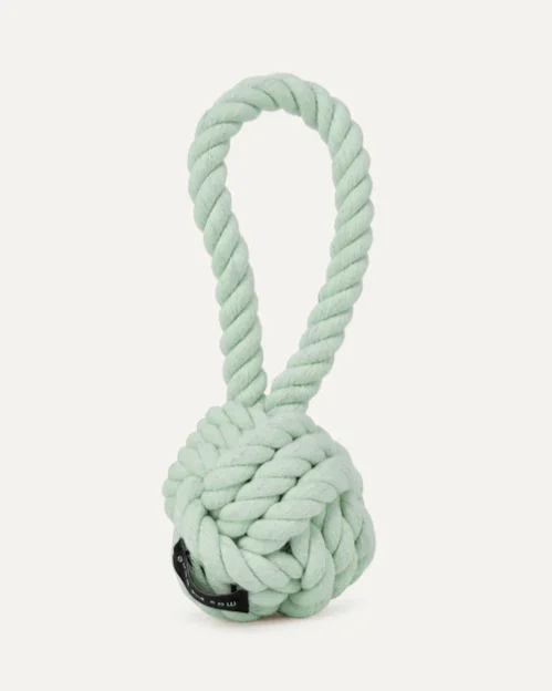 A light green rope knot with a loop at the top, designed as a dog toy.