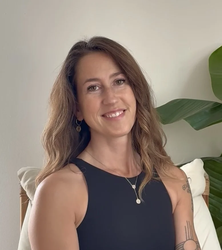 Registered massage therapist at Local Body Wellness Dartmouth specializing in TMJ, prenatal massage, and nervous system support
