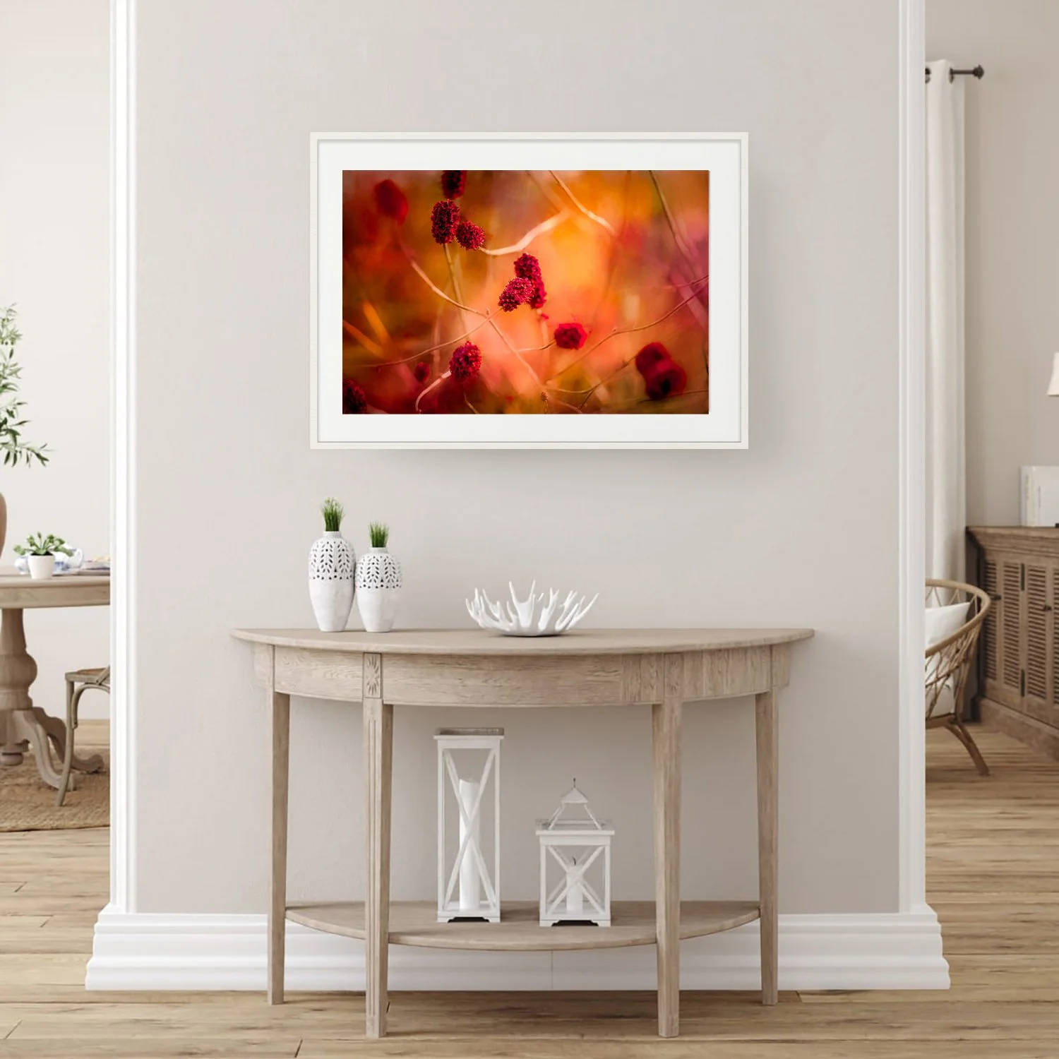 Cluster of deep red burnet flower heads on slender stems against a warm amber and orange background — painterly fine art botanical print by Laura Berman.