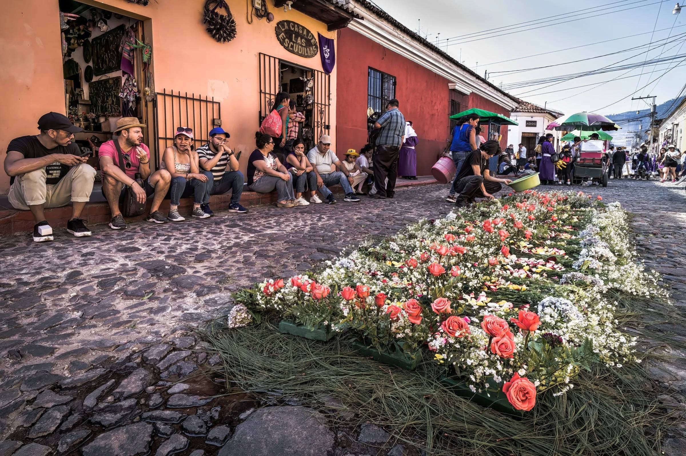 Colored Sawdust and Flowers transforming Streets into Colorful Carpets or "alfombras"