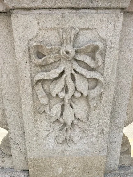Carving · Photography (2024) · Carving on a large garden urn at Longwood Gardens