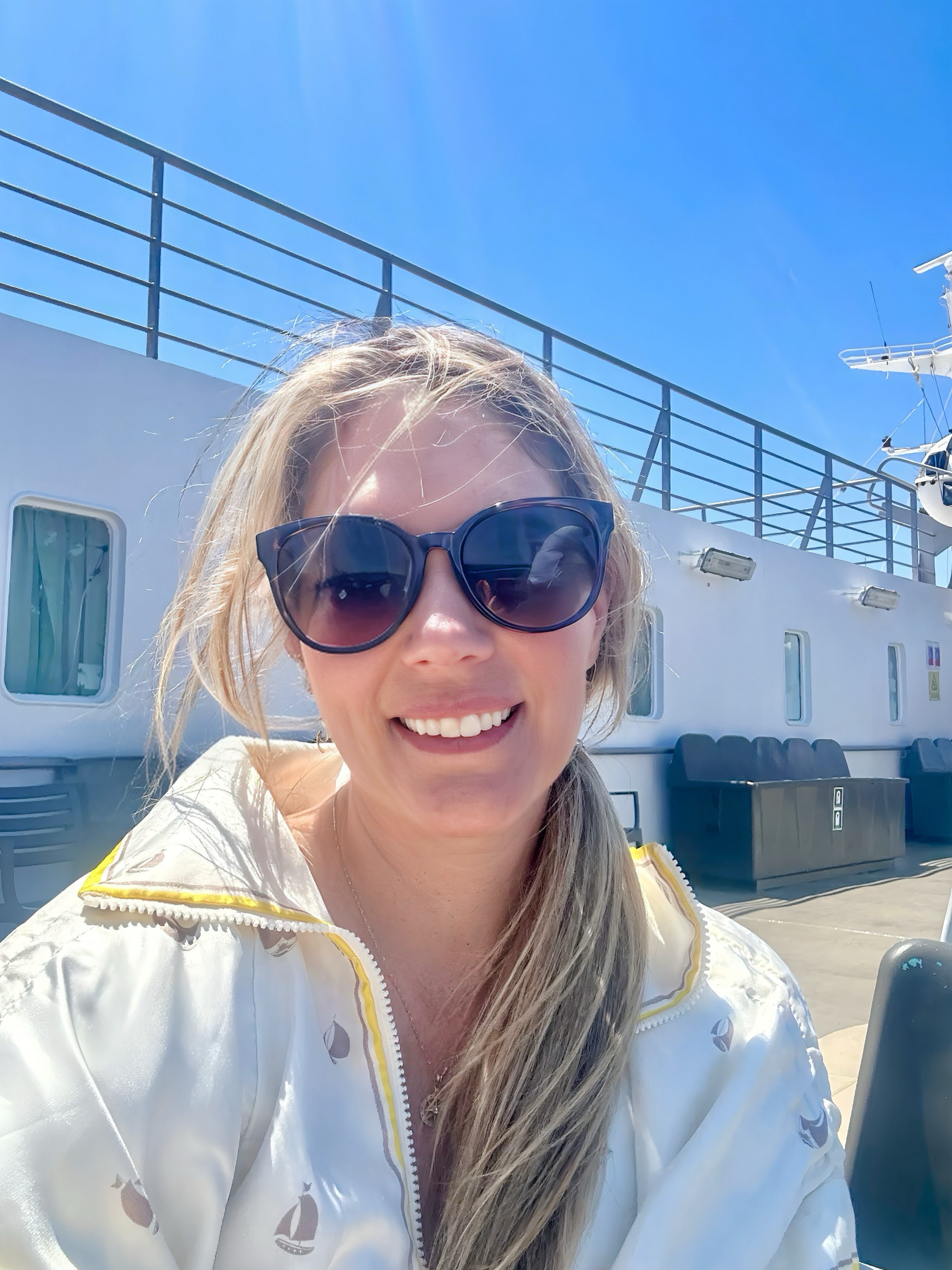 Wearing a secondhand Zimmermann jacket found in new-with-tags condition—an example of how pre-loved designer pieces integrate into my real travel wardrobe.