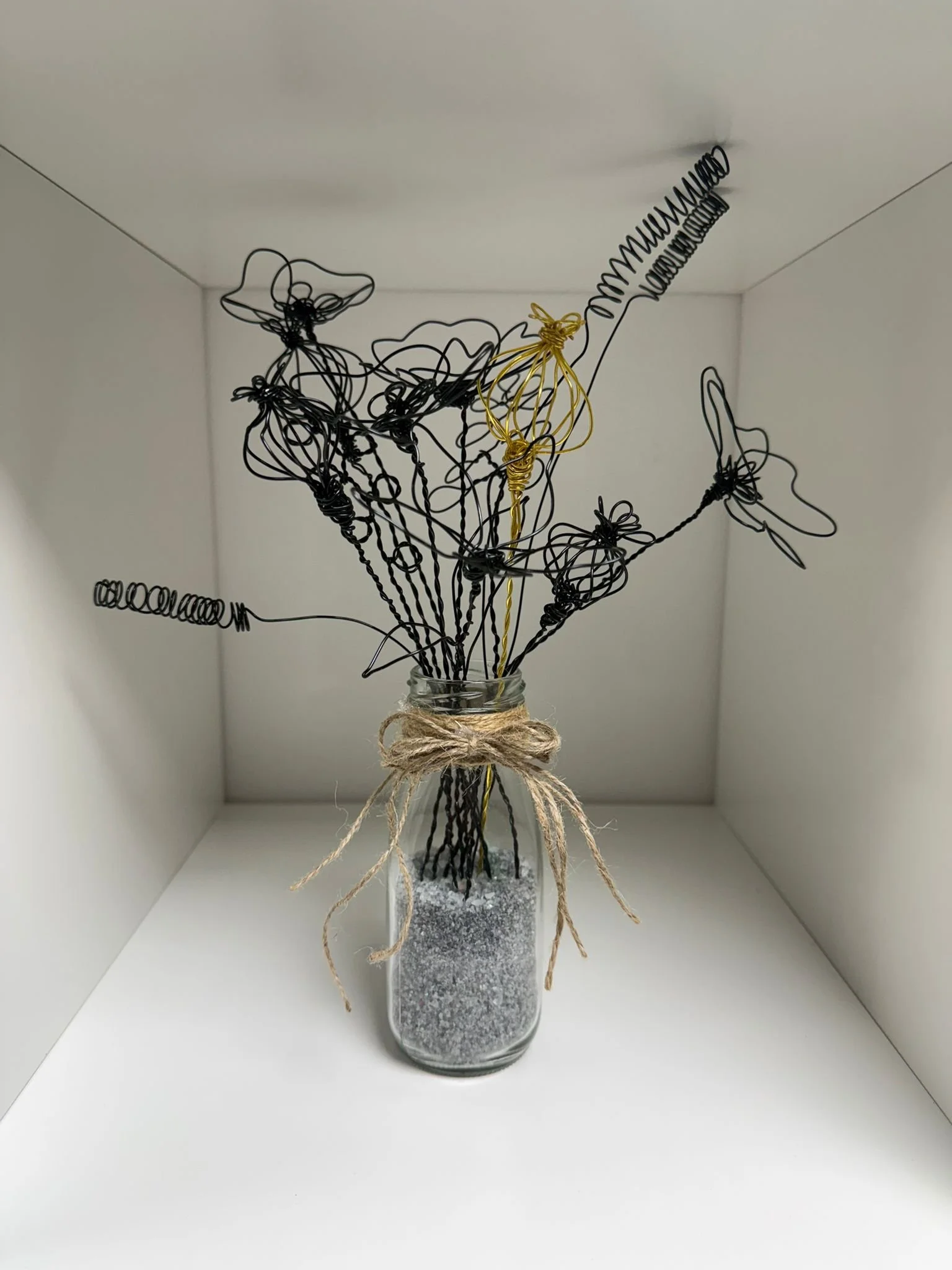 Vase of wire flowers