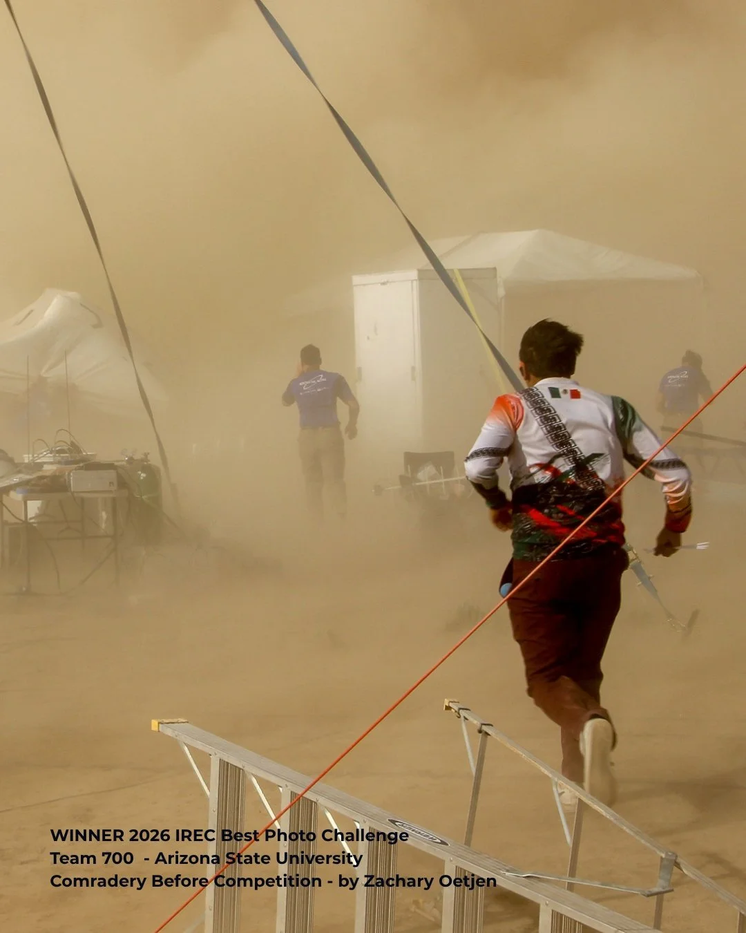 The ESRA Media team would like to congratulate Zachary Oetjen on their 2026 IREC Best Photo Challenge WINNING entry "Comradery Before Competition" for Team 700 - Arizona State University. Not only does the picture showcase the IREC, it enca
