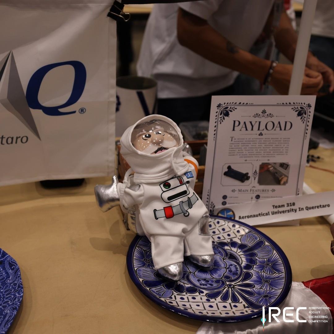 Pictured "2026 IREC Team 310 Aeronautical University In Queretaro" One of the many plushies that came to the IREC this year. Which one was your favorite?

#ESRA #IREC2026 #AeronauticalUniversityQueretaro #StudentRocketry #AerospaceEducation