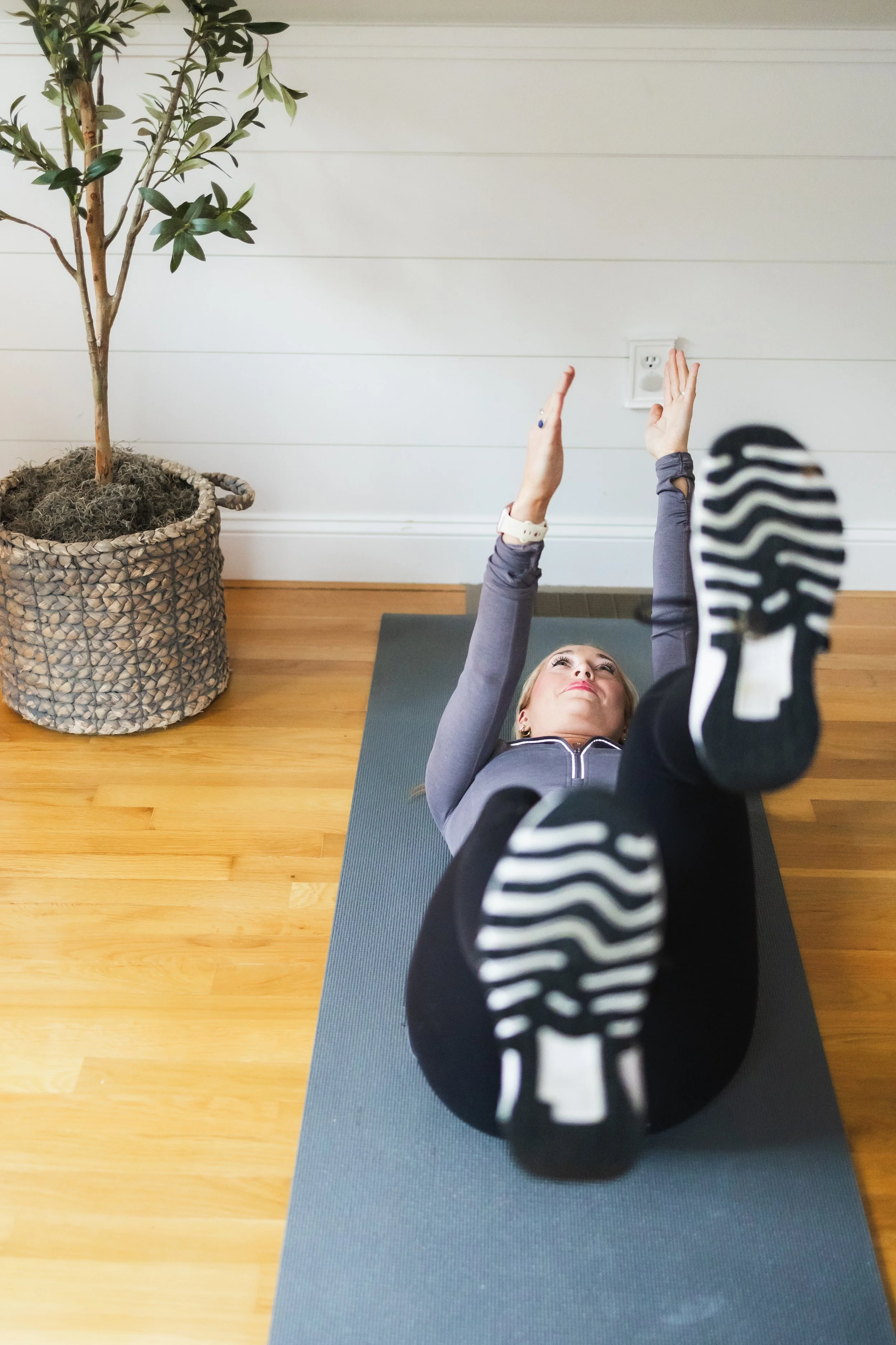 Certified Personal Trainer Diana Cross demonstrates proper form and technique to support core strength.