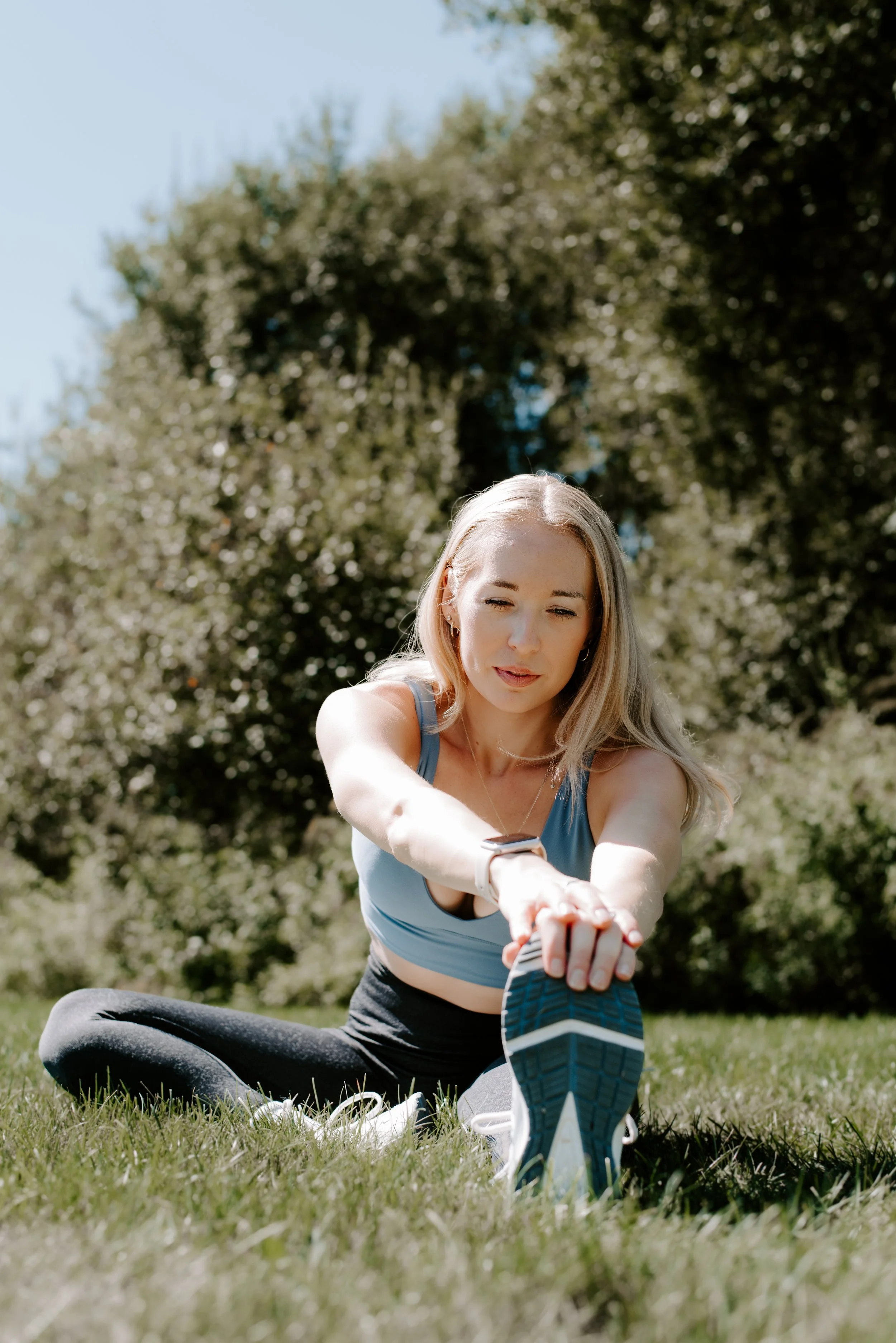 Certified Personal Trainer Diana demonstrates proper form a warm up stretch.