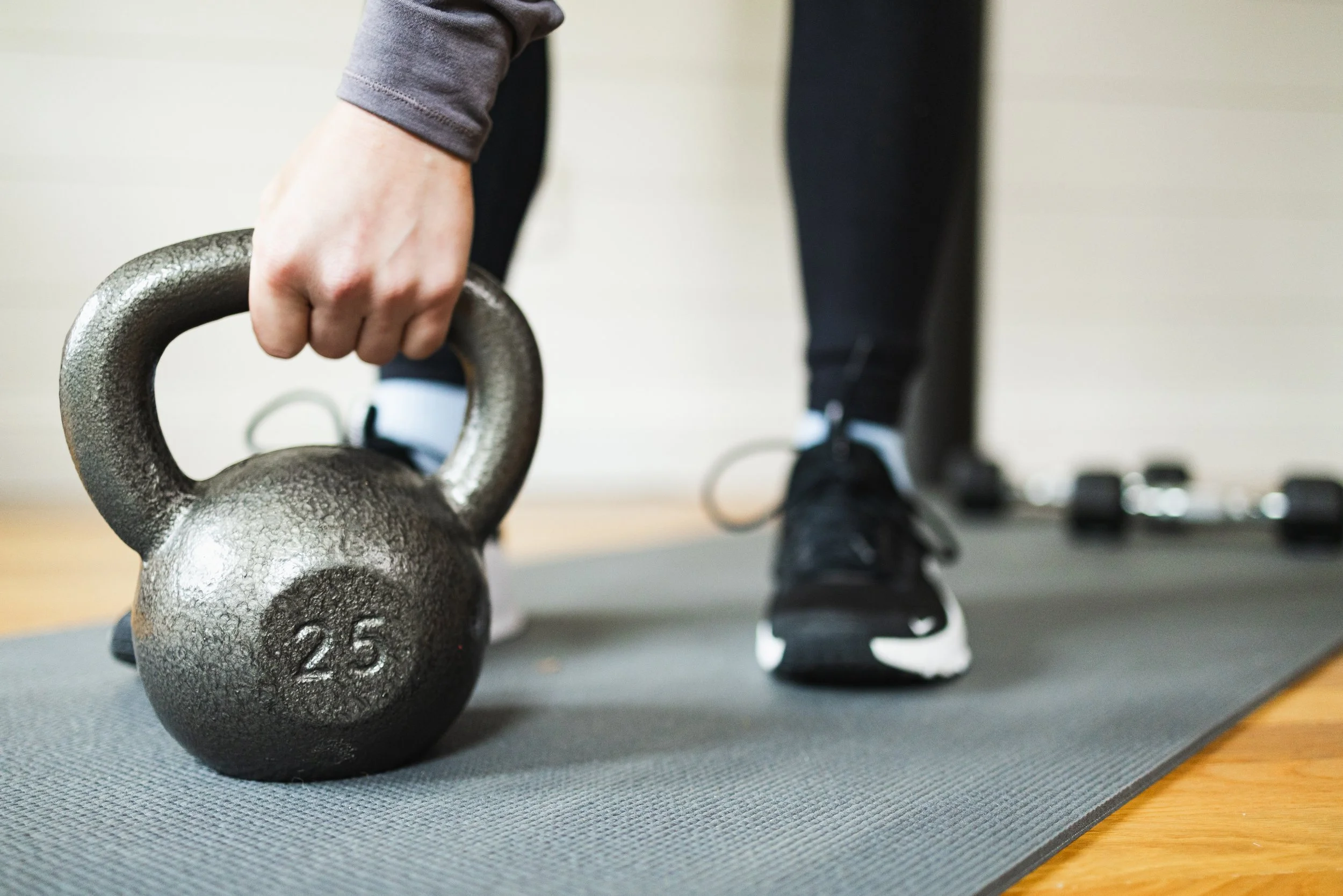 A picture of a kettlebell, a weight used to build functional strength at The Strength Continuum