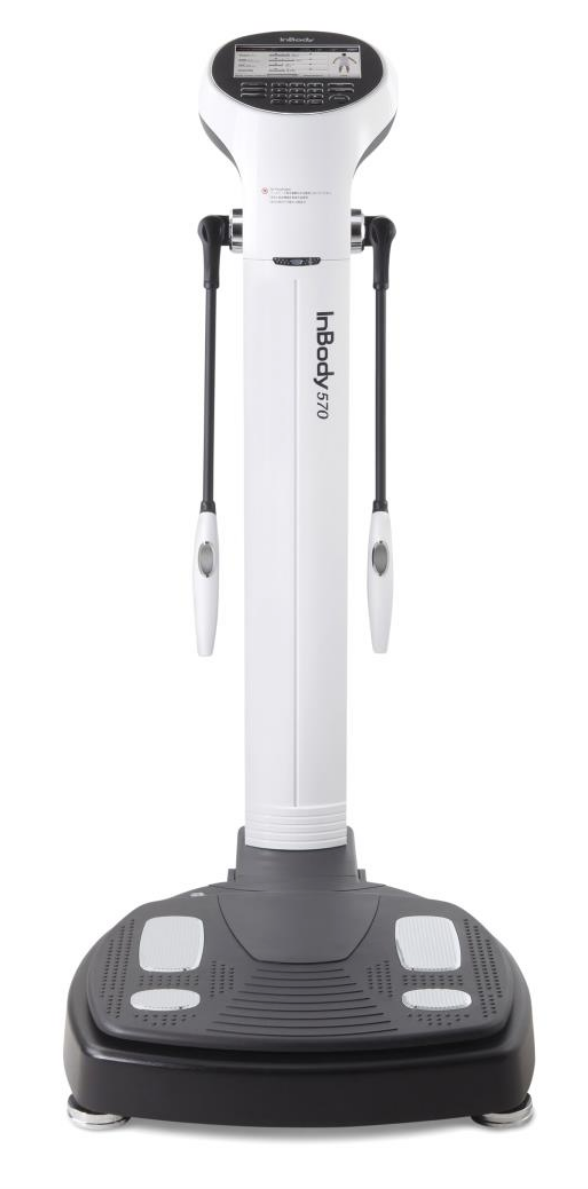 A white and black InBody machine with footpads designed to measure body composition and track progress.