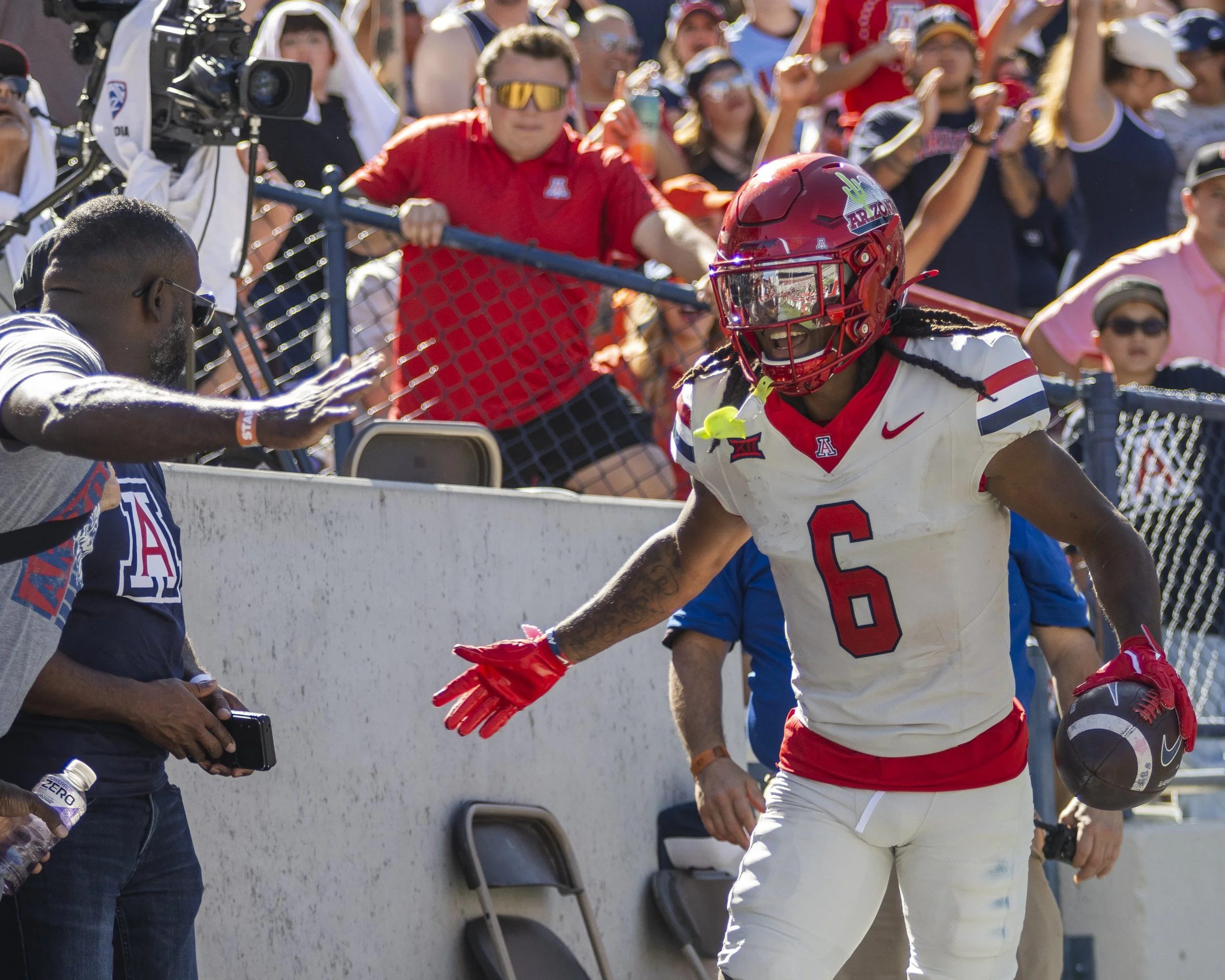 #6 celebrates with fan after TD.jpg
