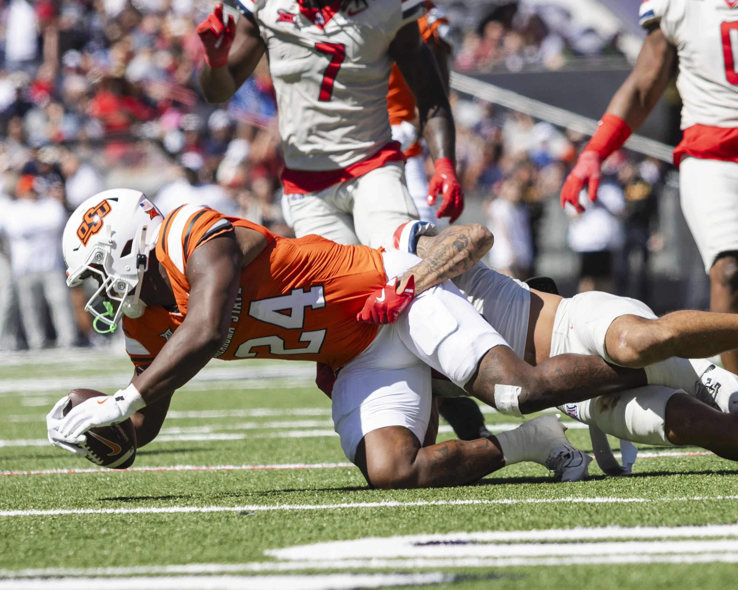 #24 of OSU tackled for loss.jpg