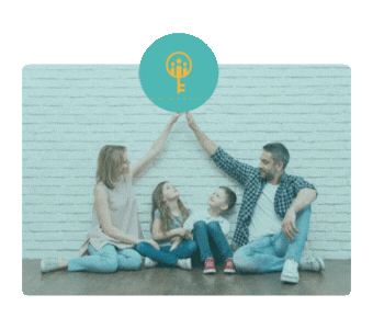 A man and two young girls sitting on the floor and high-fiving against a white brick wall with a logo featuring a tree inside a keyhole above them with wording "100+families"