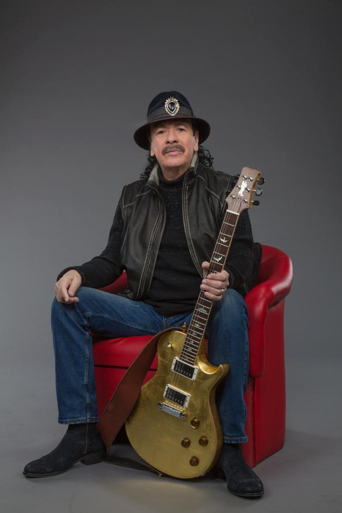 Carlos Santana featured on the song Passion by Kyera