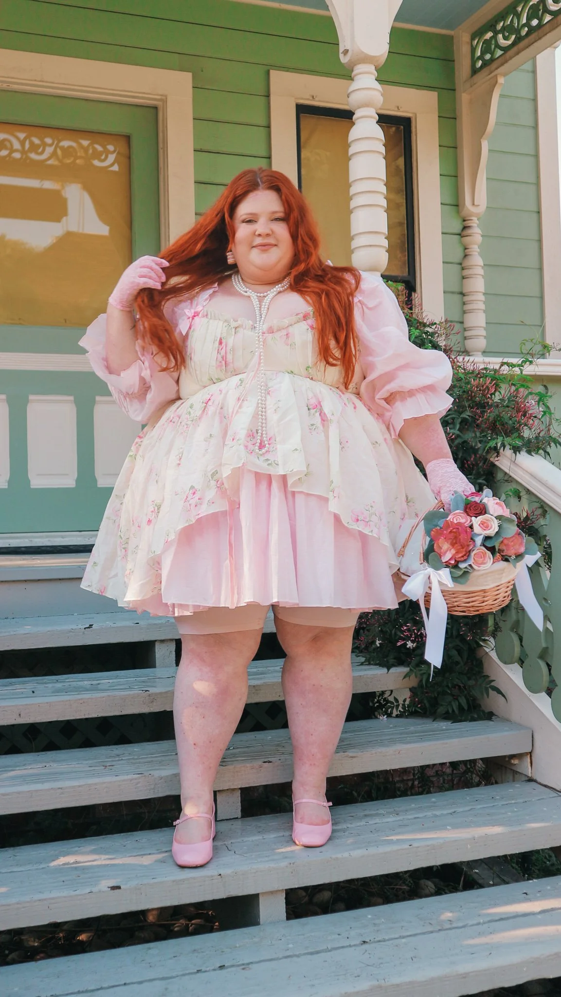 Plus size woman wearing a short dress revealing her slip shorts underneath.