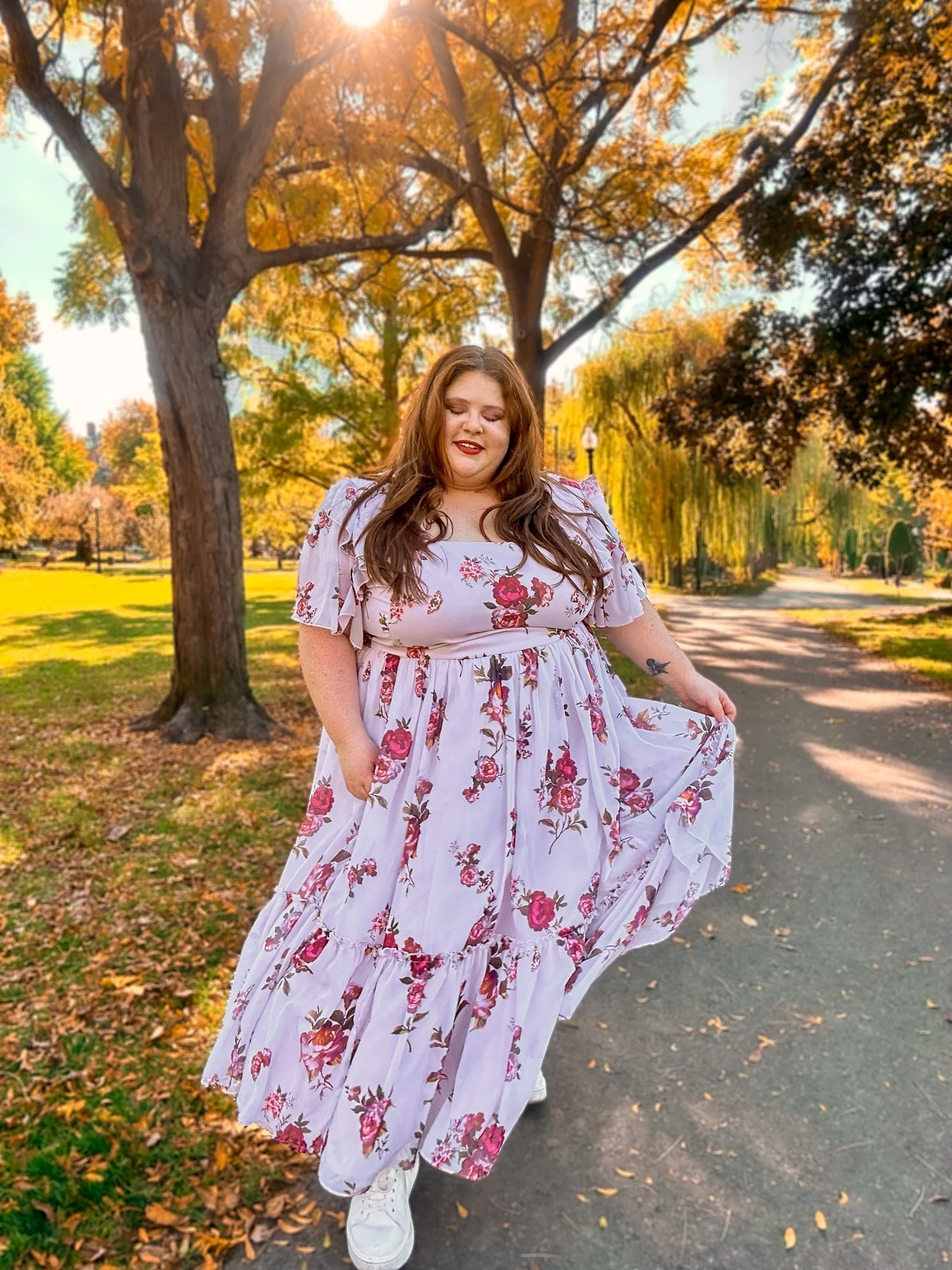 Plus size woman in a floral dress