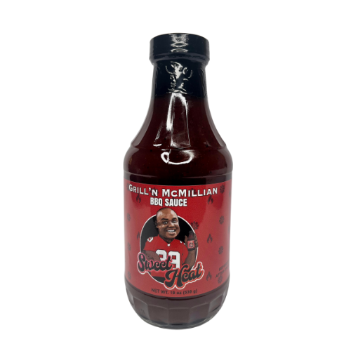 Bottle of Grill 'N McMillan BBQ sauce with a cartoon image of a smiling man in a football jersey on the label.
