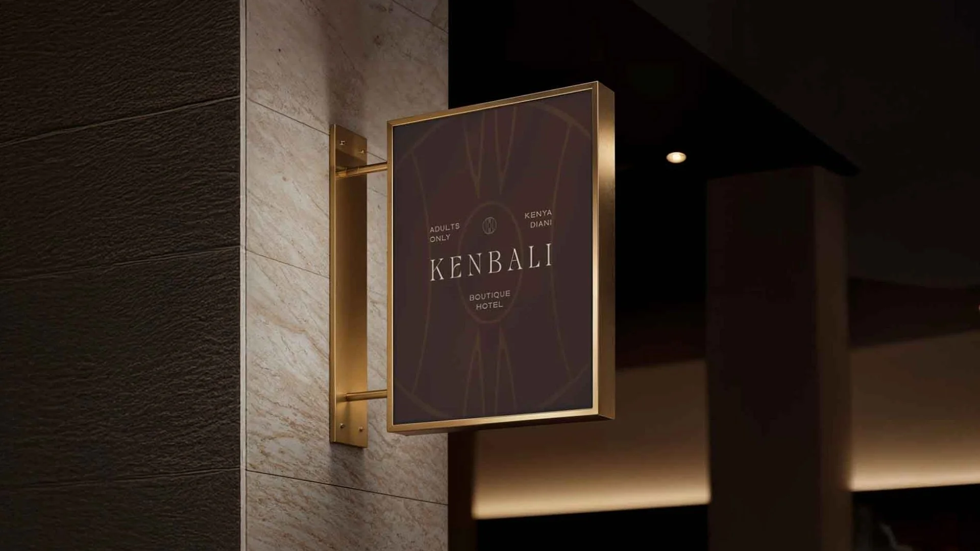 Exclusive gold facade sign with KENBALI logo for boutique hotel under construction