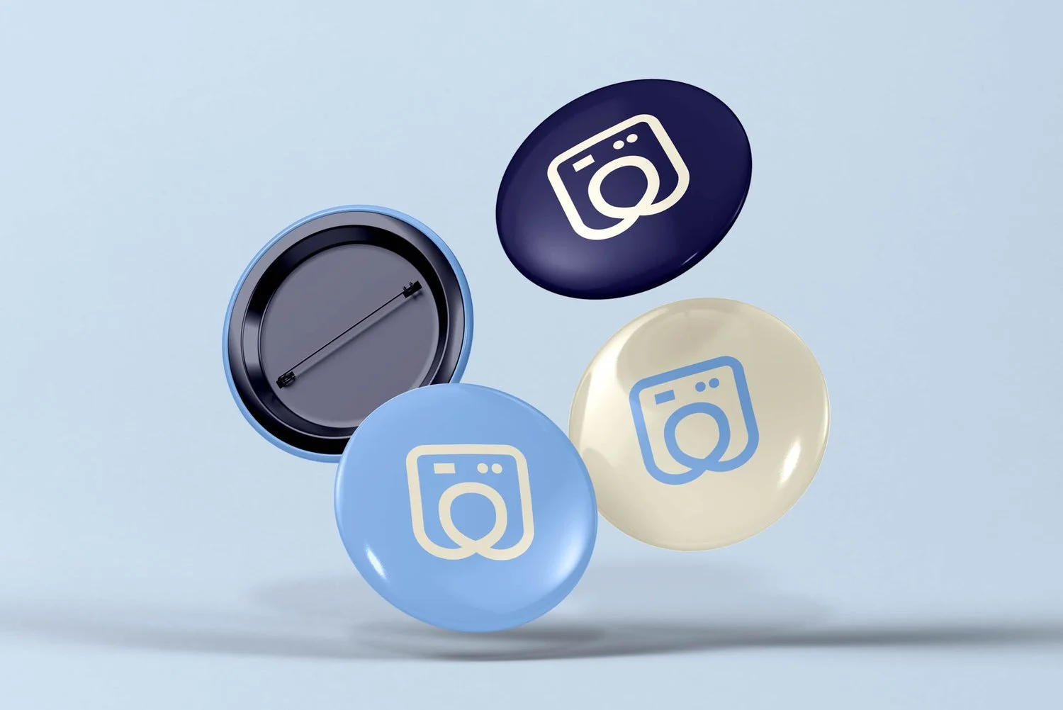 Ronde badges met wasmachine-icoon in blauw en beige voor Wasserette Haaksbergen | Brandingtoepassing