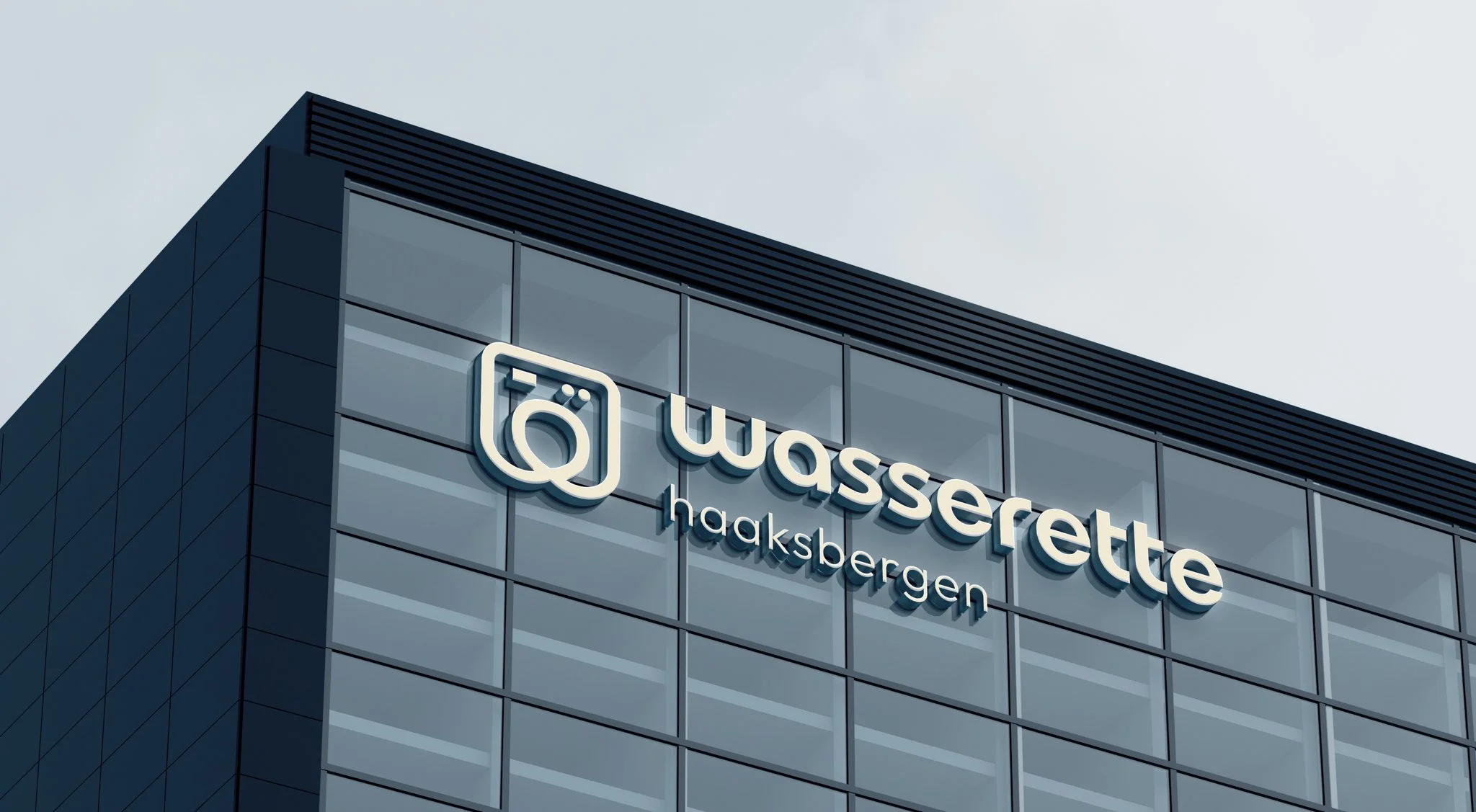 Wasserette Haaksbergen logo in 3D gevelbelettering op moderne bedrijfspui | Toepassing in exterieur
