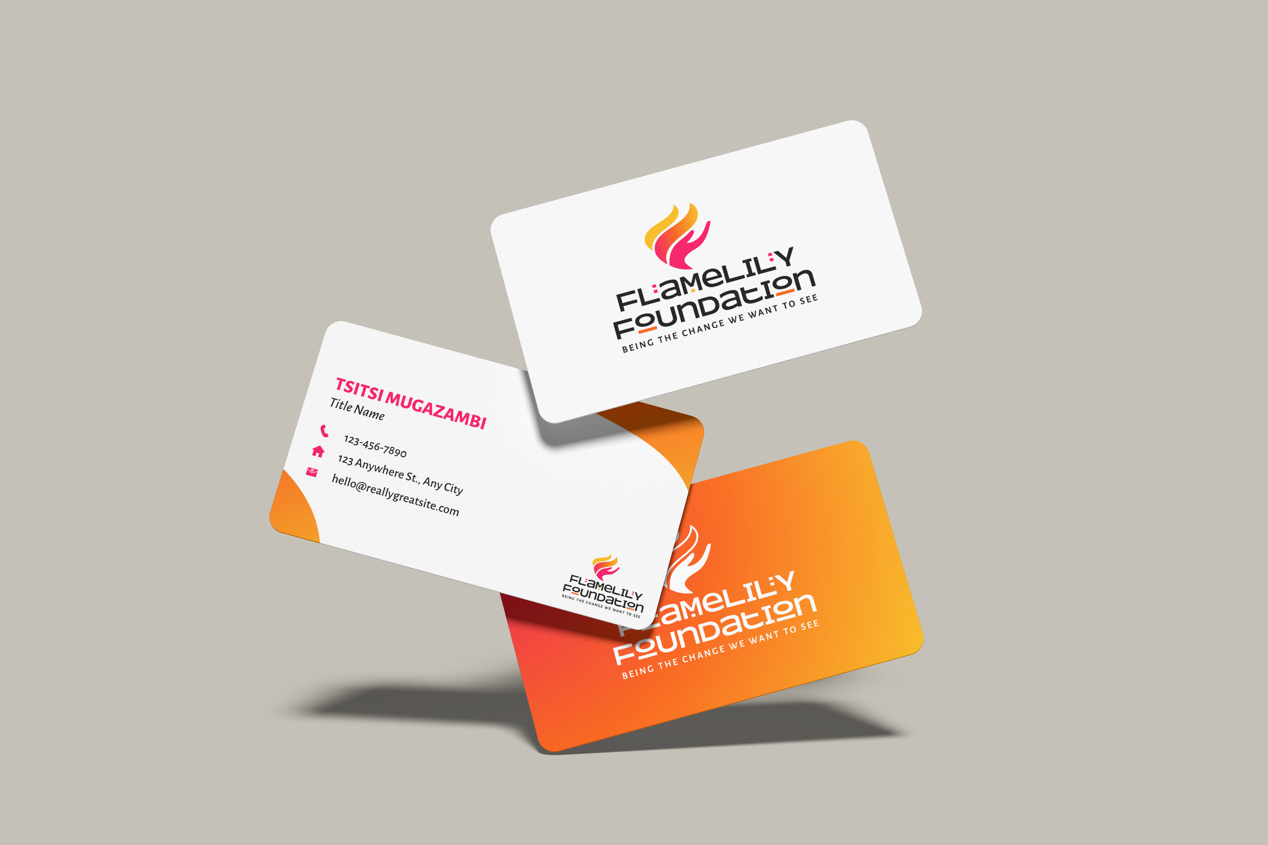 Three business cards with a logo of orange, pink, and yellow flames and the name 'FlameLily Foundation' on a light background.
