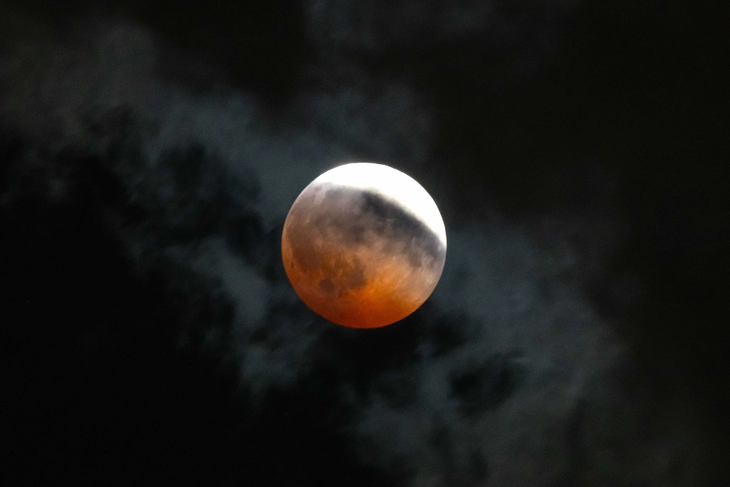 Deep Partial Lunar Eclipse 8/27/26 - Clouds over Red Moon
