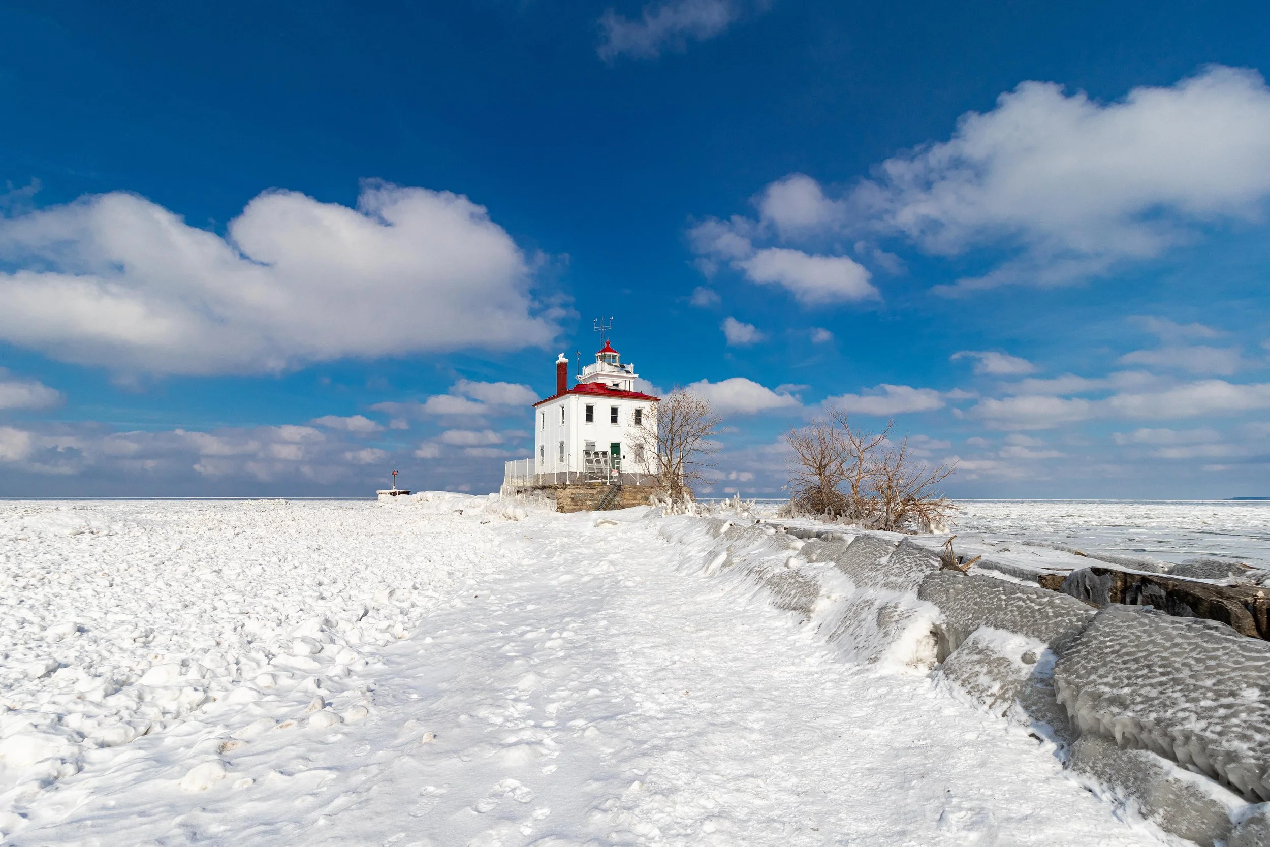 Mentor Headlands Lighthouse Snow Covered Lake-1.jpg