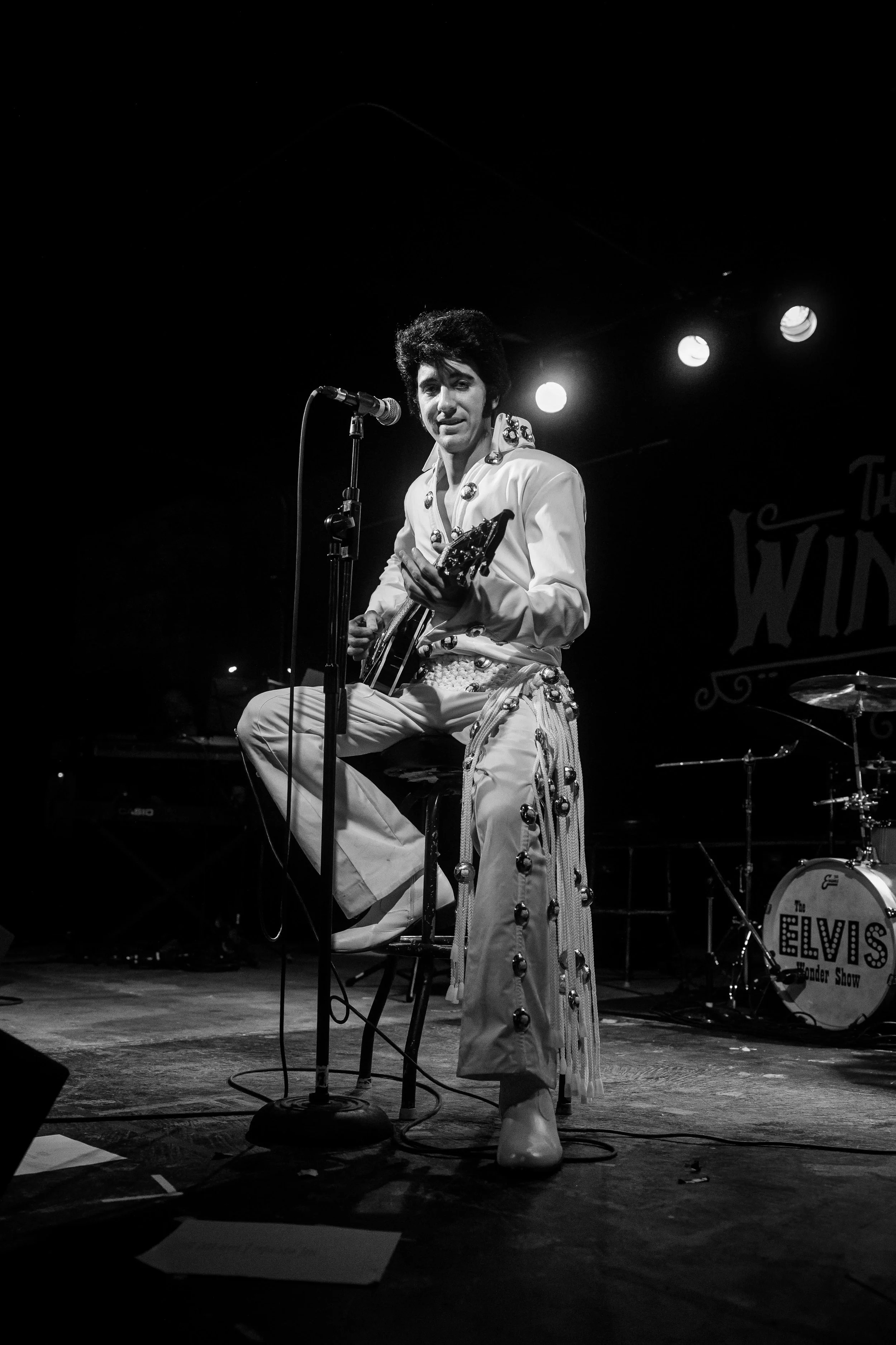 Elvis Wonder Show - Elvis Guitar on Stage Black and White-1.jpg