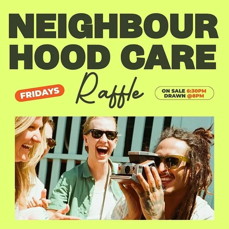 Poster advertising a neighborhood hood care raffle with a photo of four smiling women, one holding a vintage camera, all wearing sunglasses, outdoors with a teal fence in the background. The event is on Fridays, on sale at 6:30PM, drawing at 8PM.