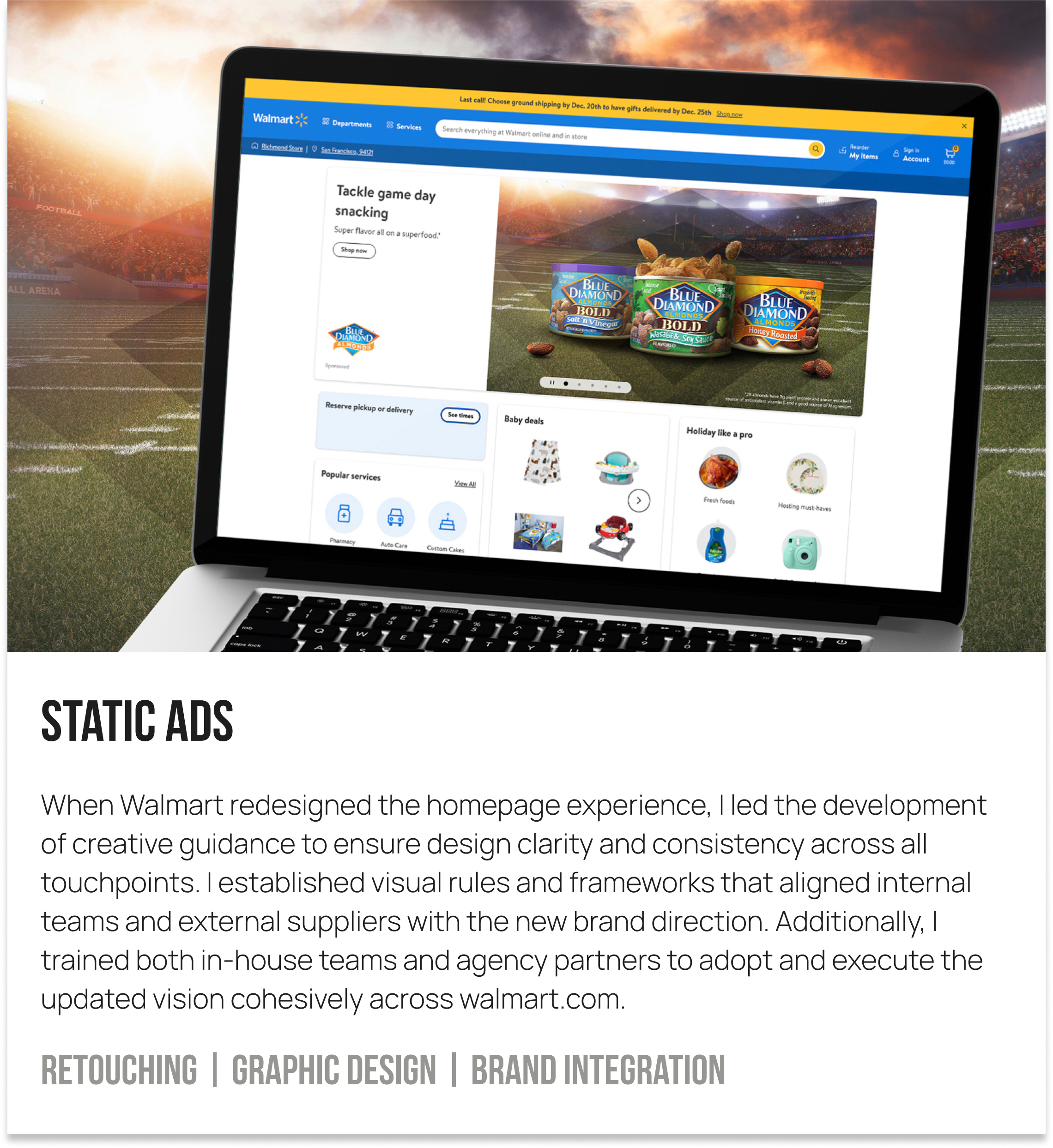 Laptop displaying Walmart online homepage on an empty football field under a sunset sky.