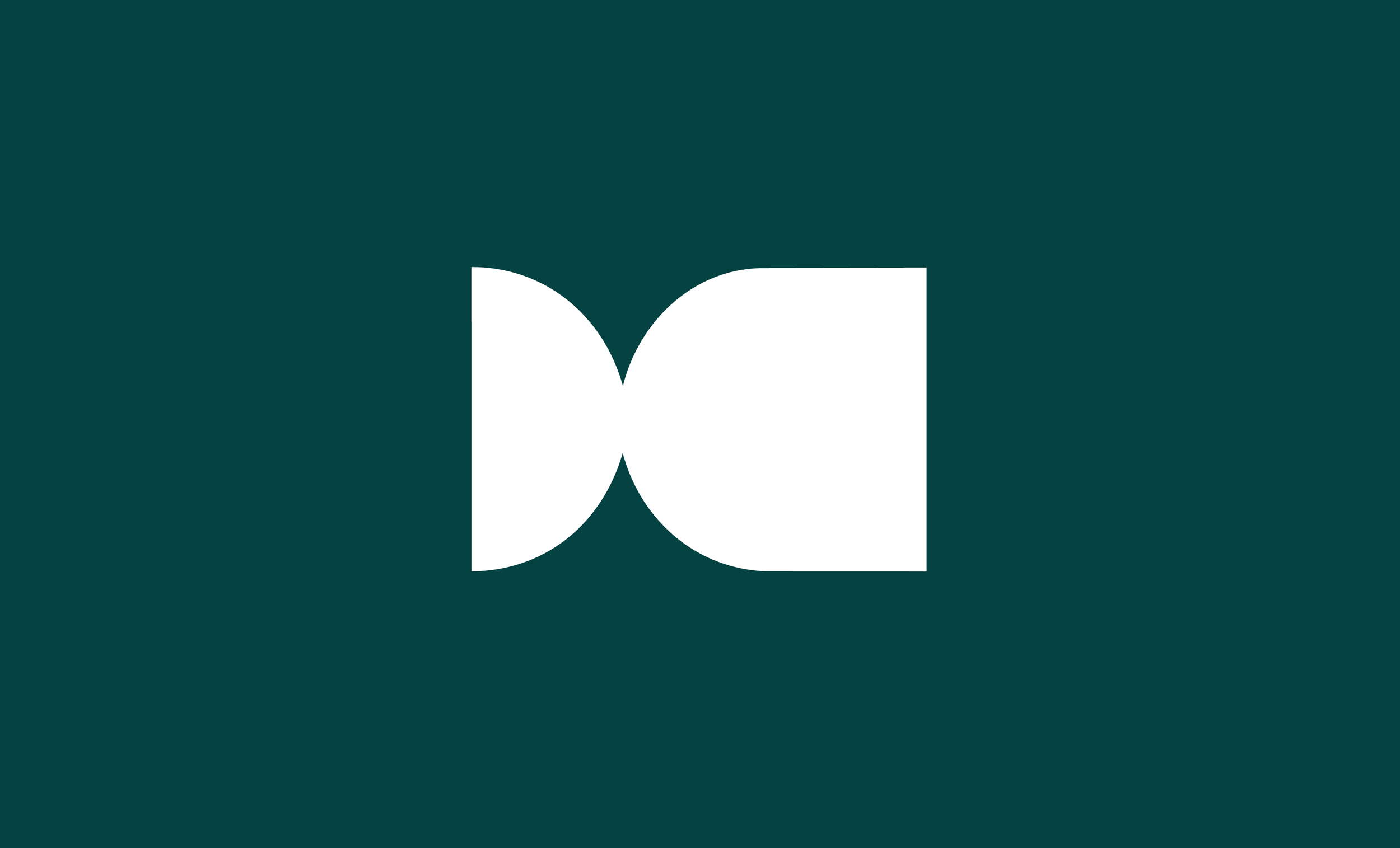 Geometric shape block logo of Property Council New Zealand on a dark green background