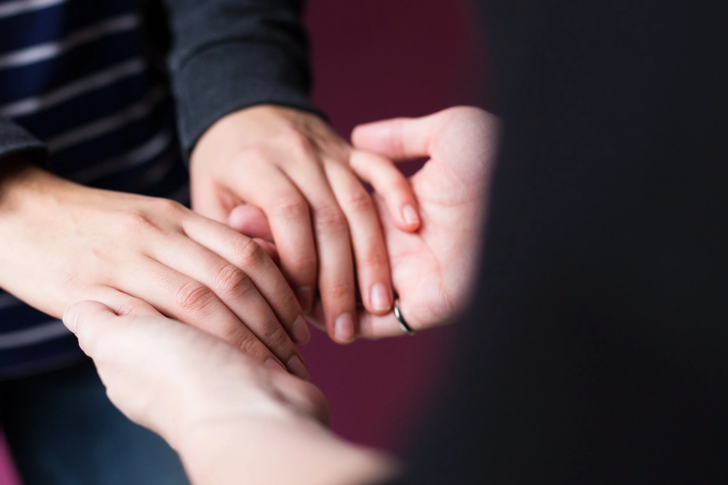Holding hands in therapy