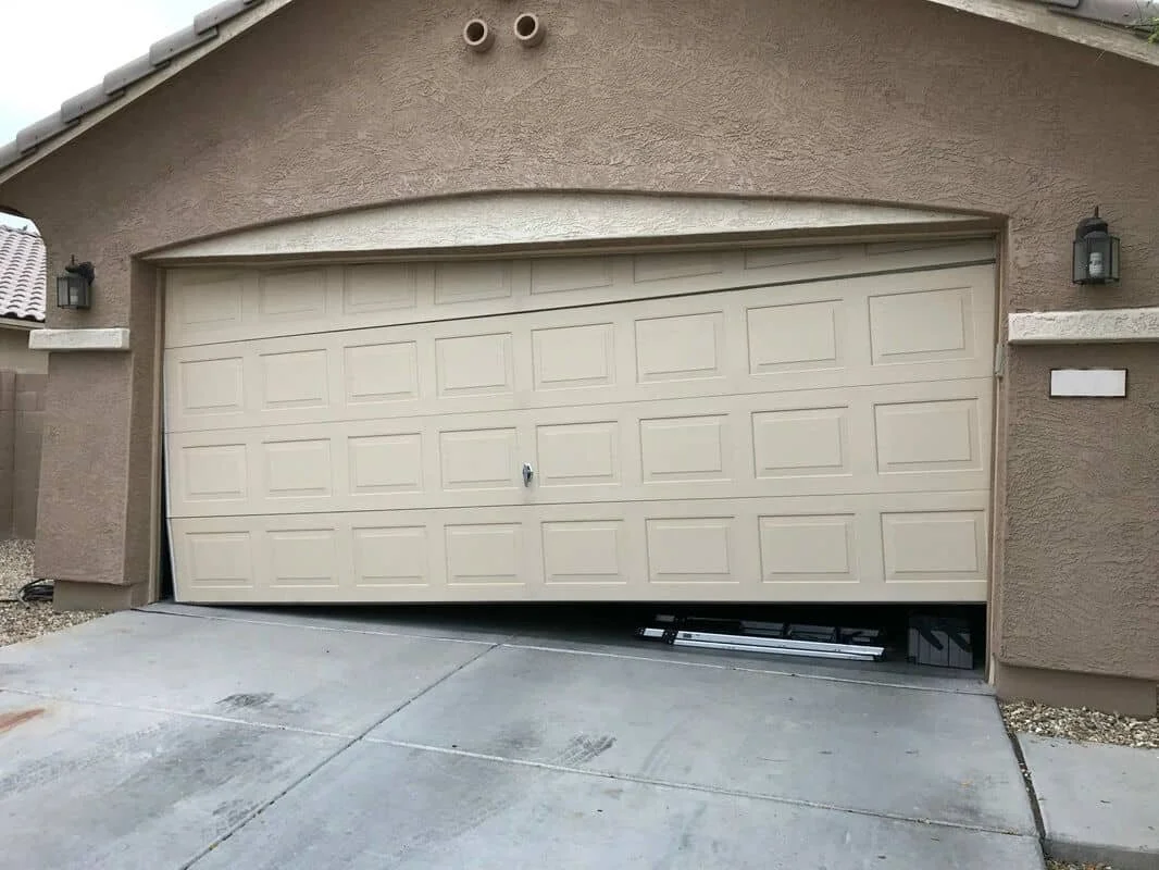 Off-Track Garage Doors: Causes, Risks &amp; Professional Repair