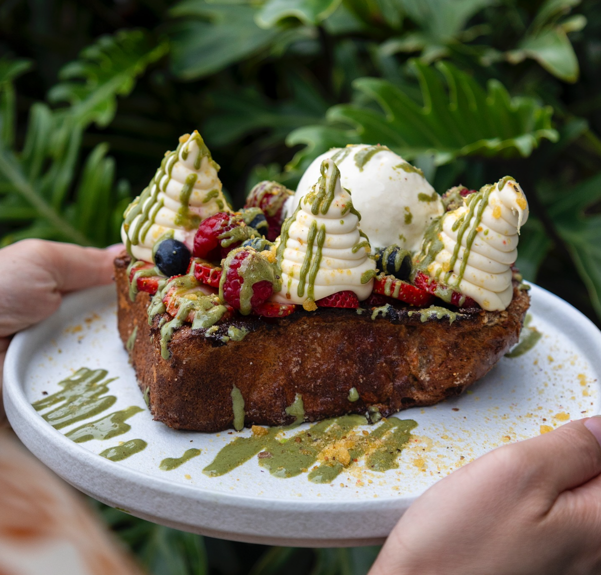 Oyku Pistachio Cream Sauce brioche dessert with berries and ice cream at Leaf Café