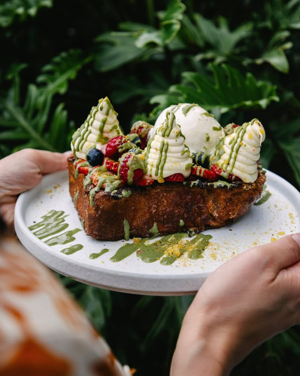 Leaf Café pistachio brioche toast topped with cream, fruit and Oyku Pistachio Cream Sauce drizzle