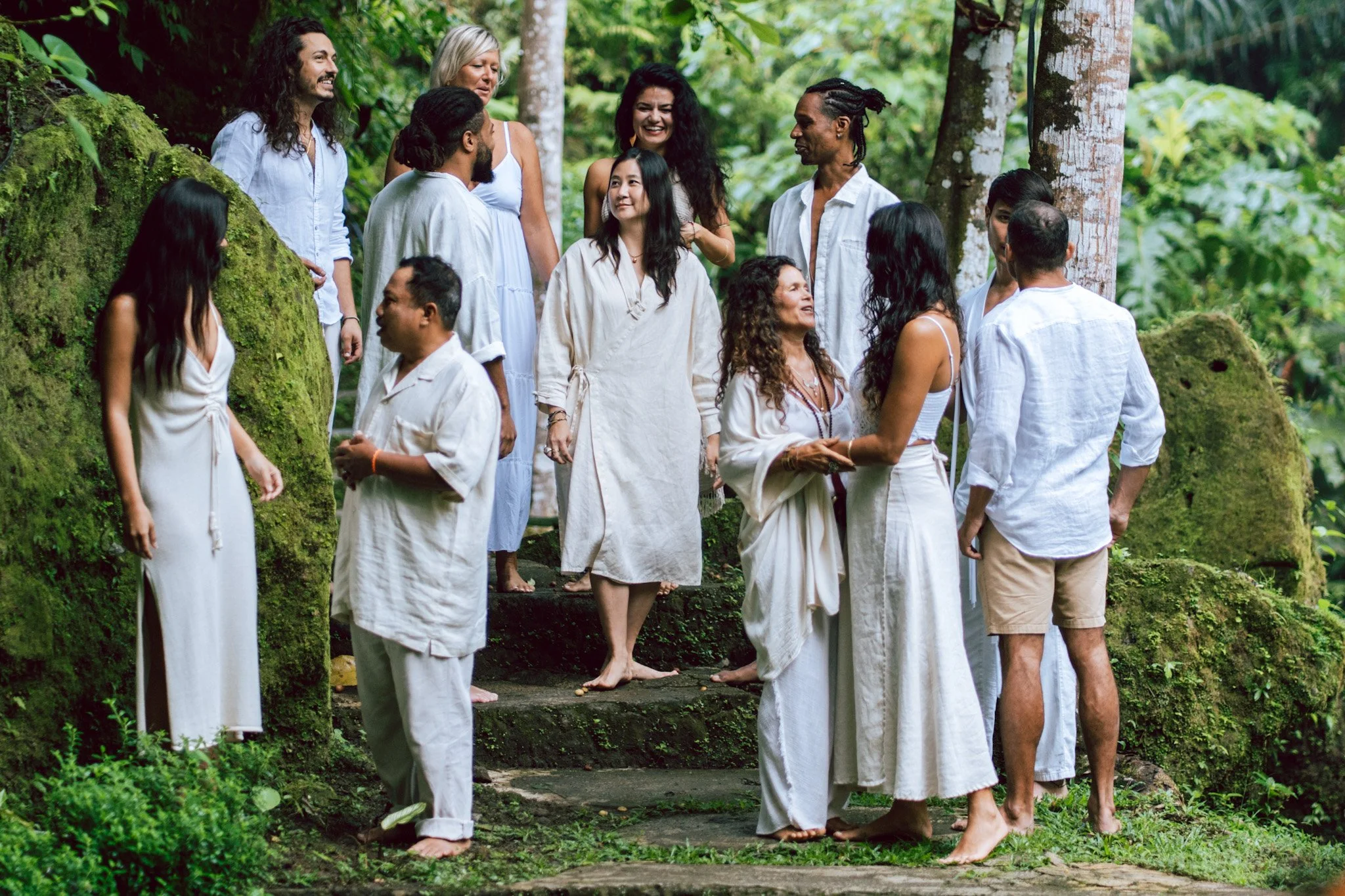 people gathered in nature while conversing