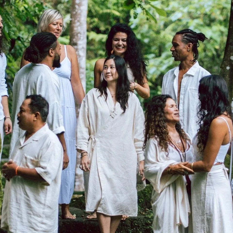 An inclusive group of people of color talking to each other.