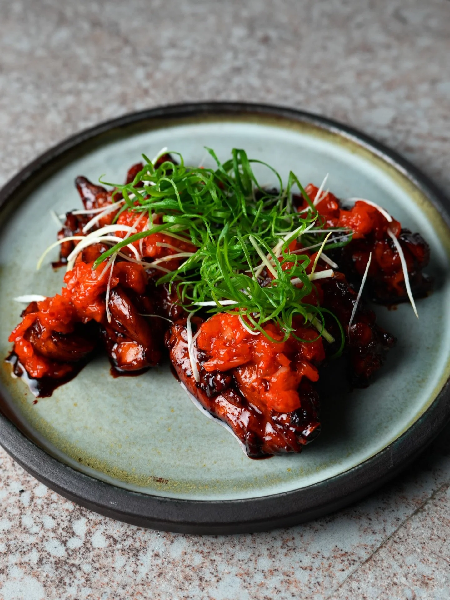 Korean BBQ Chicken Ribs w/Kimchi Relish &amp; Green Onion.

Our take on Korean BBQ chicken garnished with a beautiful kimchi relish and fresh green onion.

Book now - Link in bio : www.soraonpirie.com.au