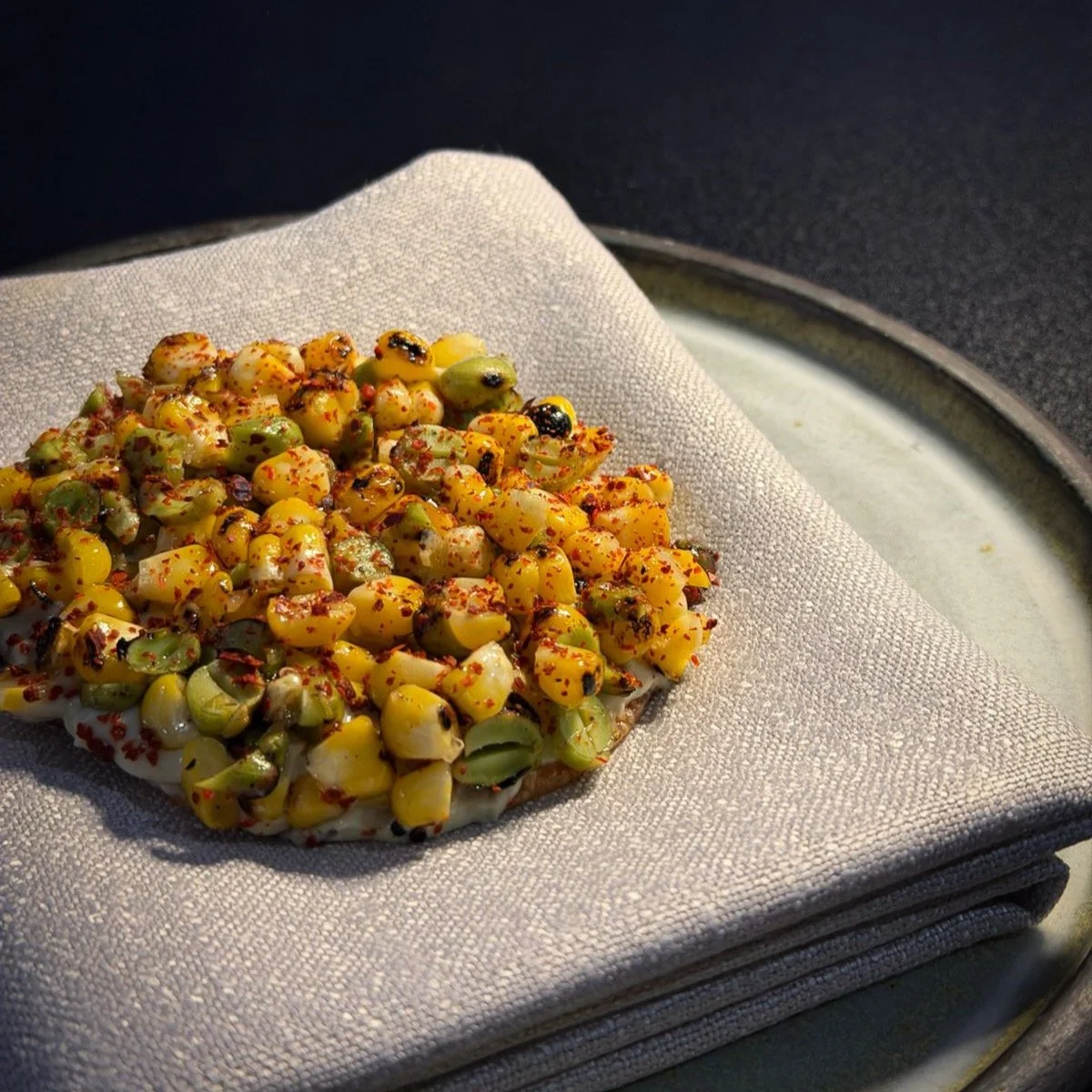 BBQ miso corn tostada, charred edamame &amp; avocado mousse.

Book your table via the link in our bio 🥢