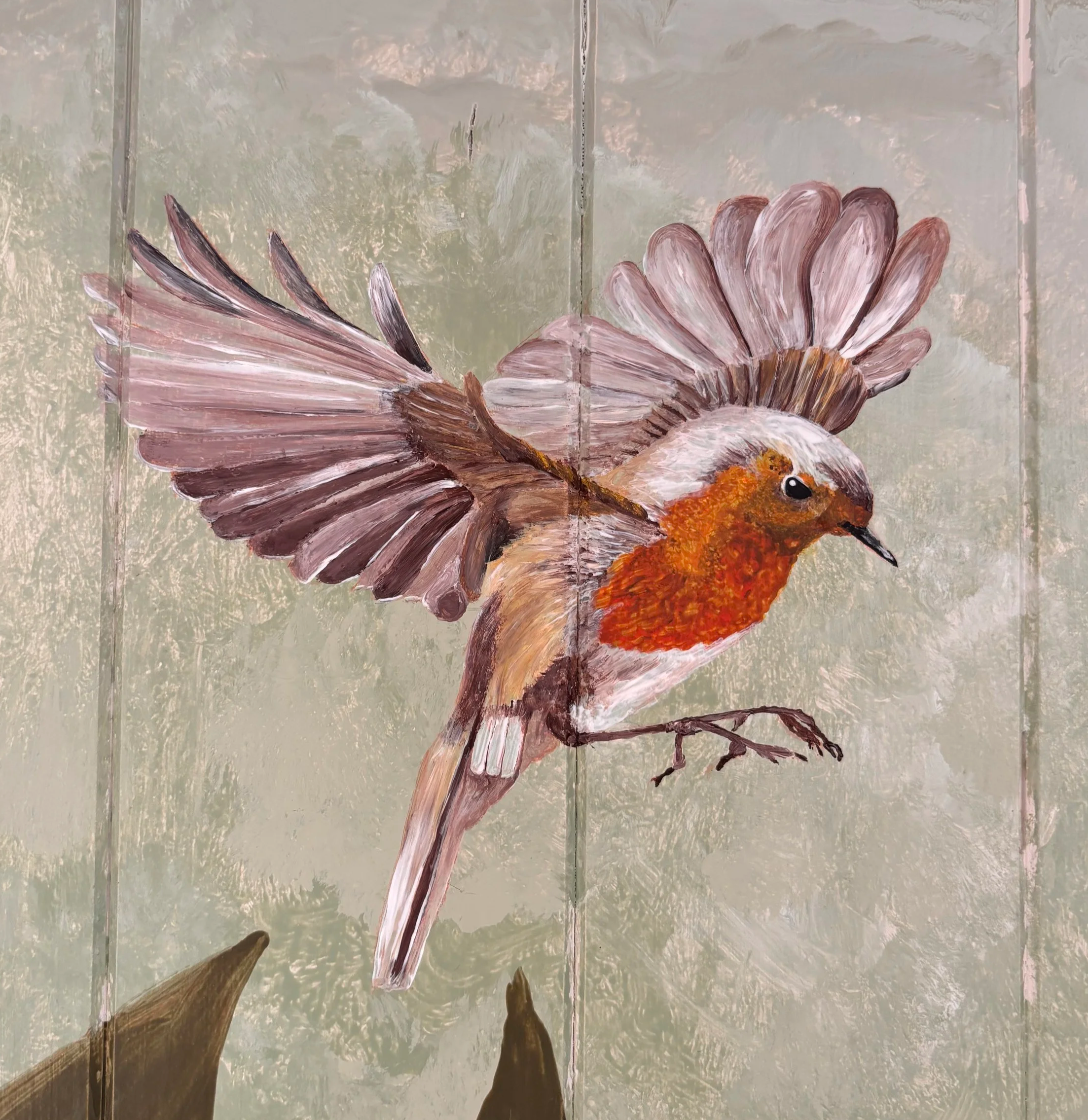 custom hand-painted robin mural celebrating the beauty of British wildlife. featuring a detailed robin surrounded by natural foliage and botanical elements, this bespoke mural creates a calming focal point for homes, garden rooms, commercial spaces