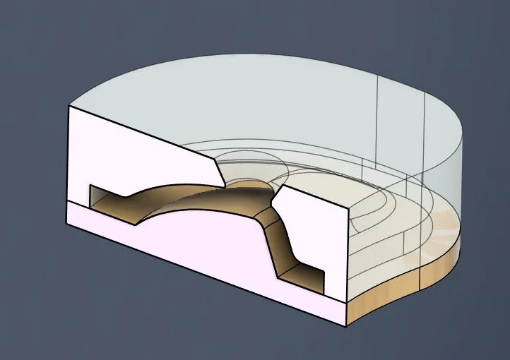 Modélisation technique d'un moule avec des sections transversales révélant ses couches internes, en blanc, beige et marron.