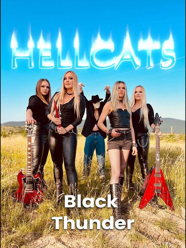 Hellcats promo photo for Black Thunder featuring the all-female heavy metal band with instruments and a masked figure in a field.