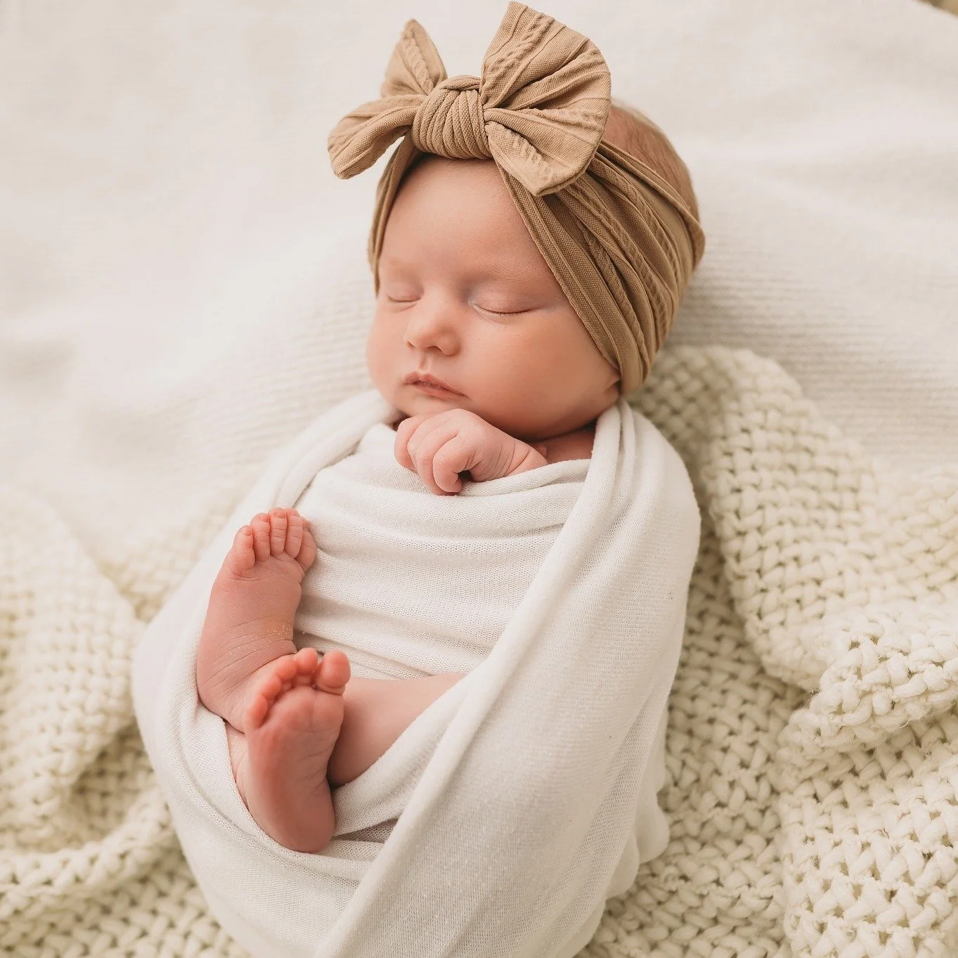 This beautiful girl was an absolute dream to photograph, tiny hairbands, sleepy cuddles, and parents completely smitten with her. Capturing these early days, when everything is new and time feels like it stands still, is always such an honour.

These