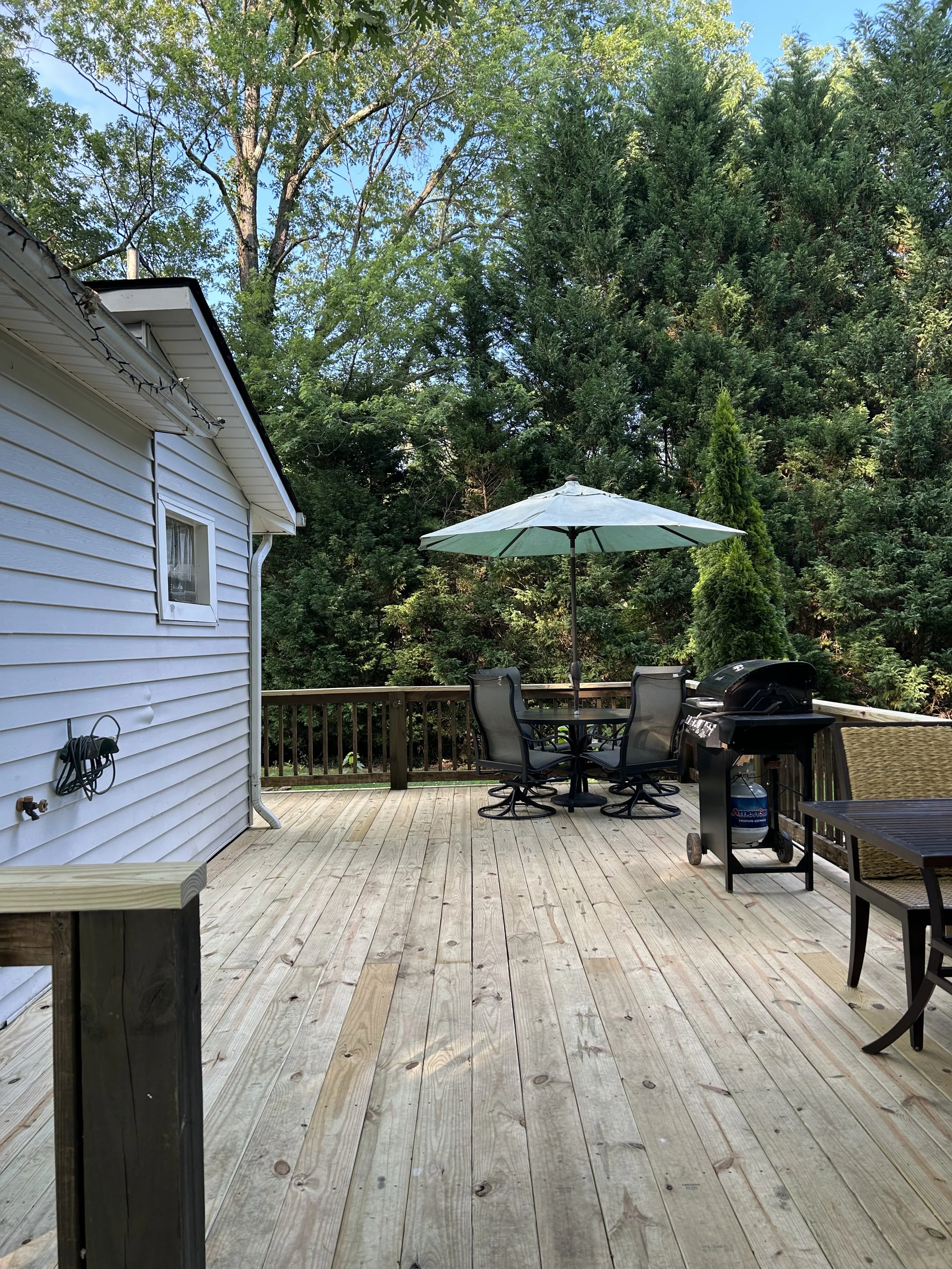 New deck utilizing good lumber from original deck.