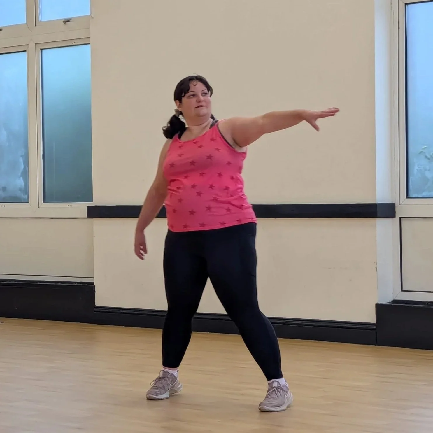 fat, white, female demonstrating dance pose