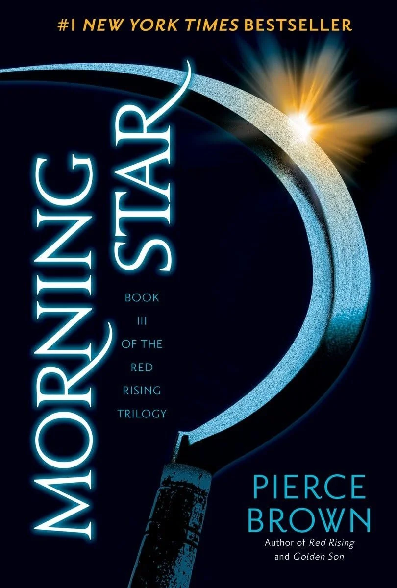 Book cover titled 'Morning Star', part of the Red Rising trilogy, with neon blue text and a depiction of a jump rocket or spaceship. The cover indicates it is a #1 New York Times Bestseller by Pierce Brown.