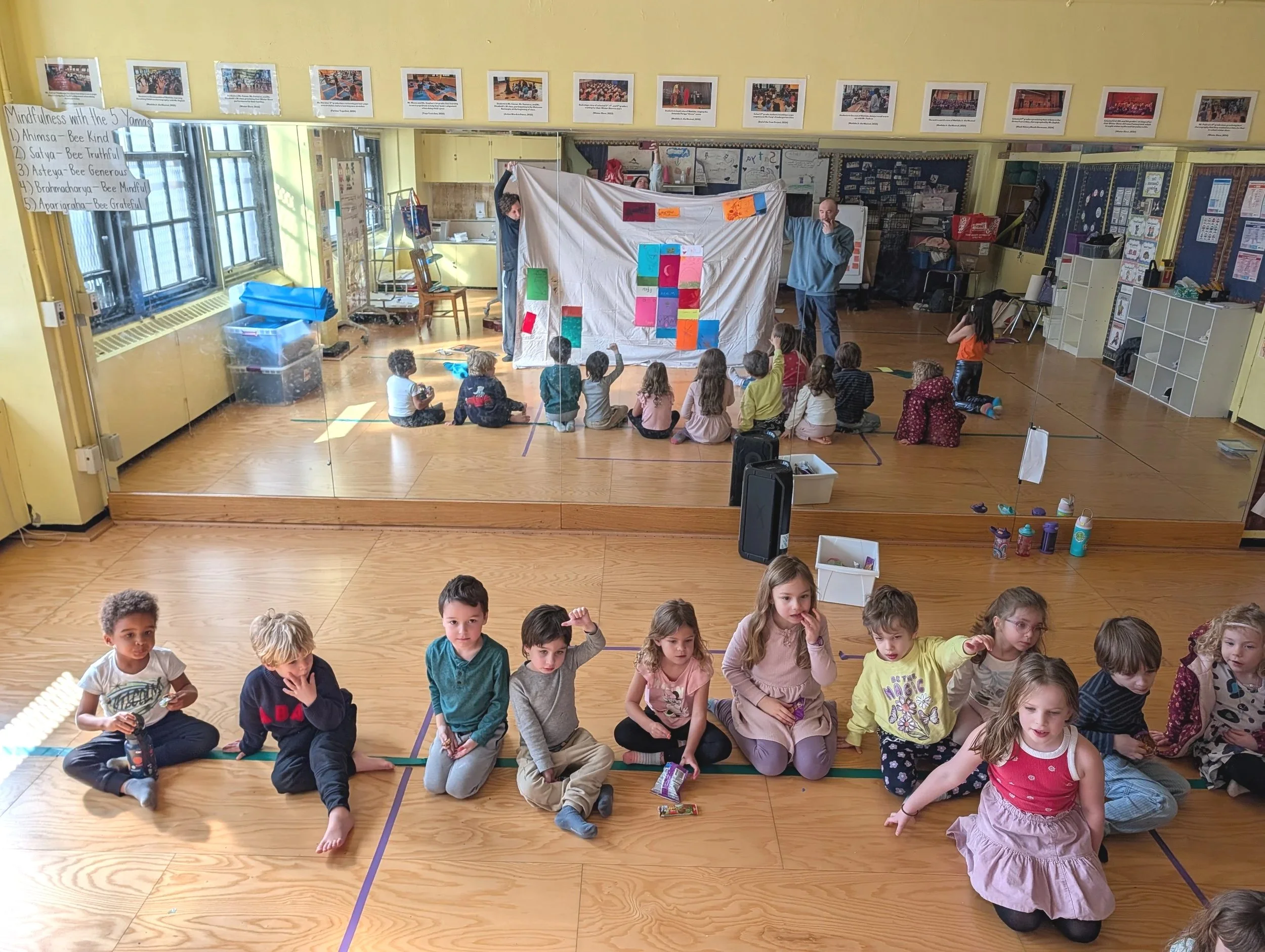 Brooklyn kids reviewing their secular Jewish art, as part of their secular Jewish education at Kol Am