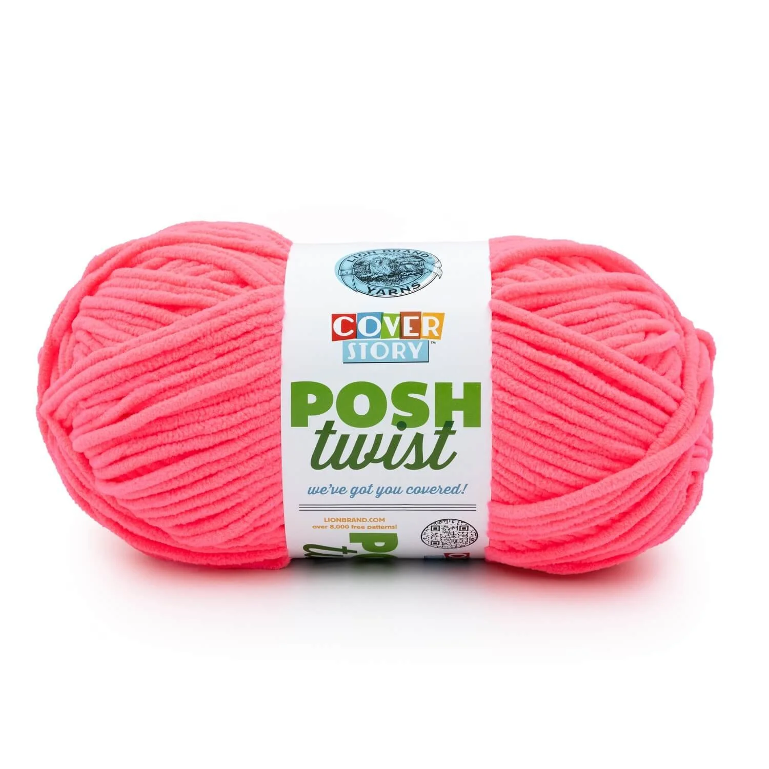 Bright pink yarn with a white label featuring colorful text and a small logo.