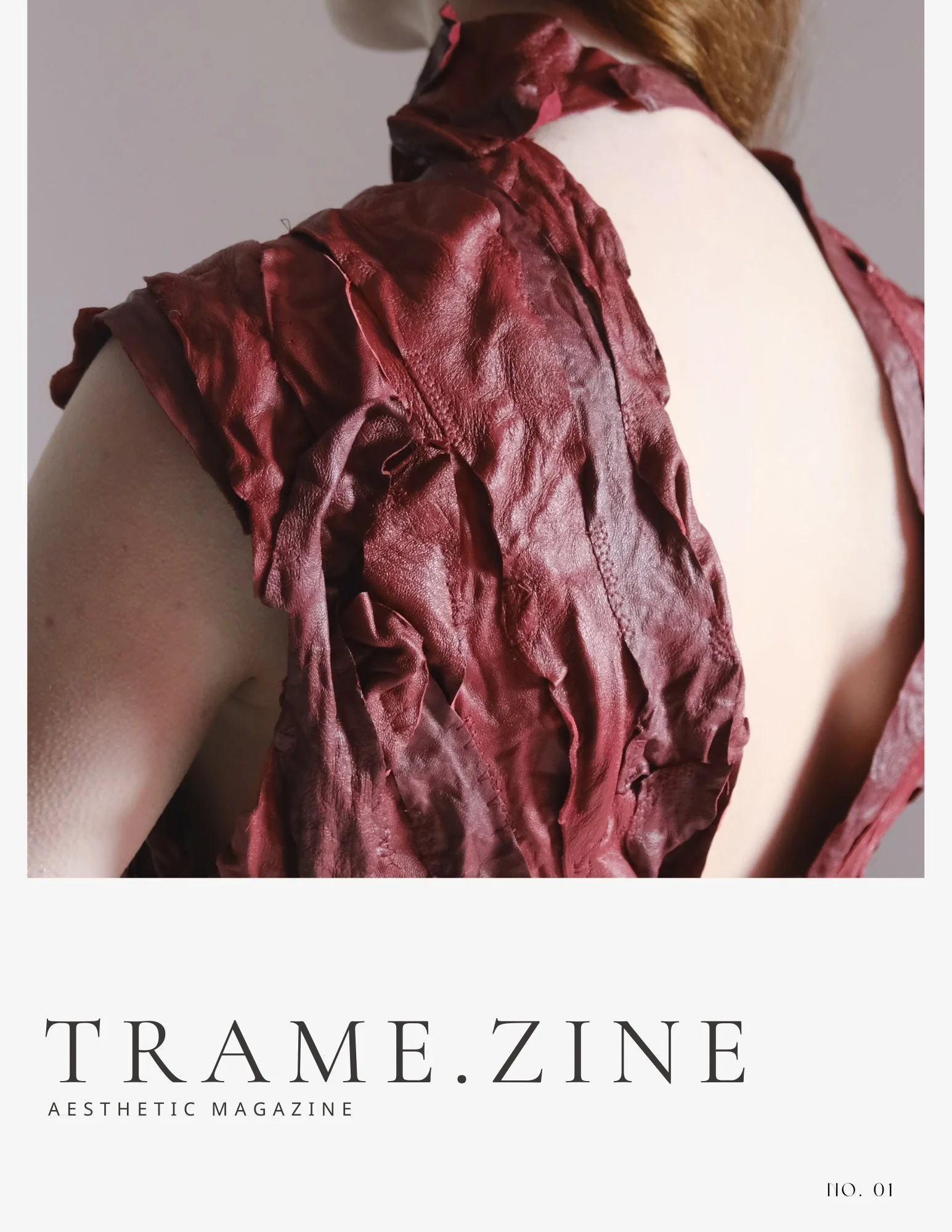 Close-up of a person wearing a red, crinkled, leather-like sleeveless jacket, with part of their back exposed, against a neutral background. Text overlay reading 'TRAME.ZINE AESTHETIC MAGAZINE NO. 01'.