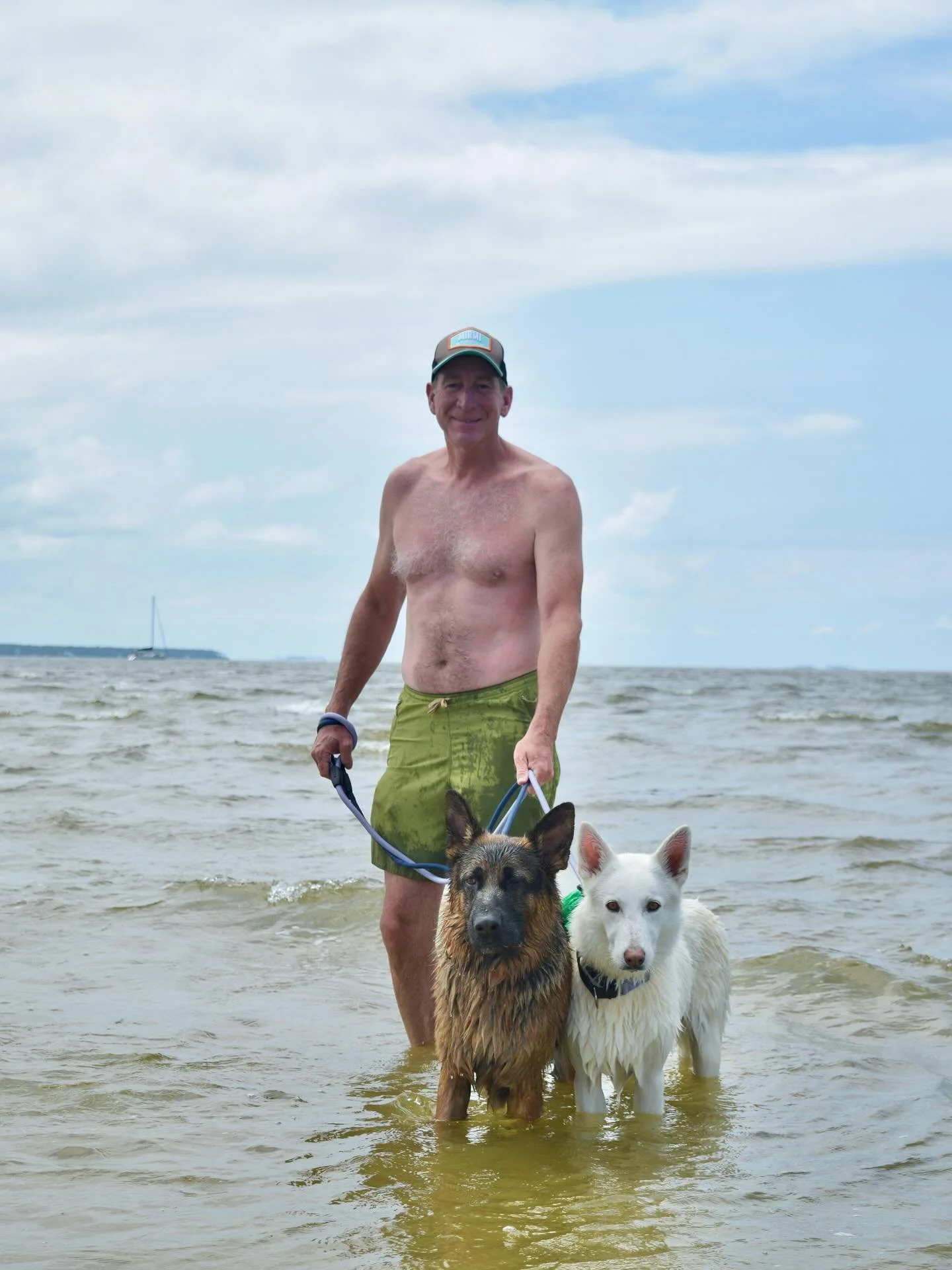 Saw this man with his pups while on a beach in the Outer Banks with family - I couldn&rsquo;t take my eye off this trio! Finally when I got the courage, I asked if he wanted some photos of him with his dogs. He said he doesn&rsquo;t have many photos 