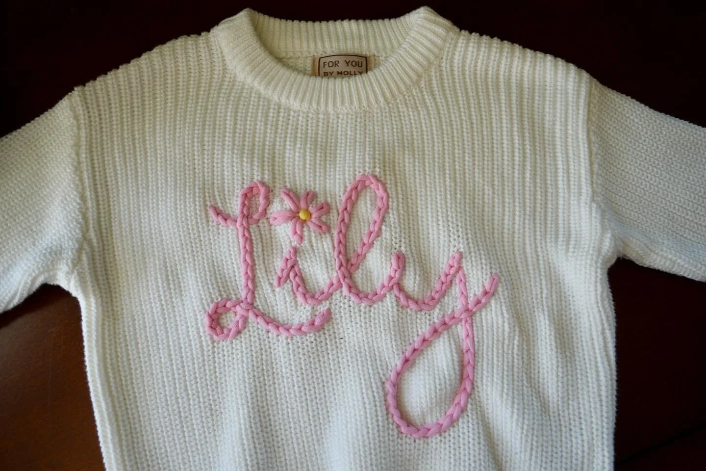 🌸 Lily 🌸

Hi friends!! It&rsquo;s been so busy over here in the best way possible, but man I have been slacking on posting. 

This adorable sweater for sweet Lily was so fun to make! The  little flower detail makes this design super cute 🩷 

DM to